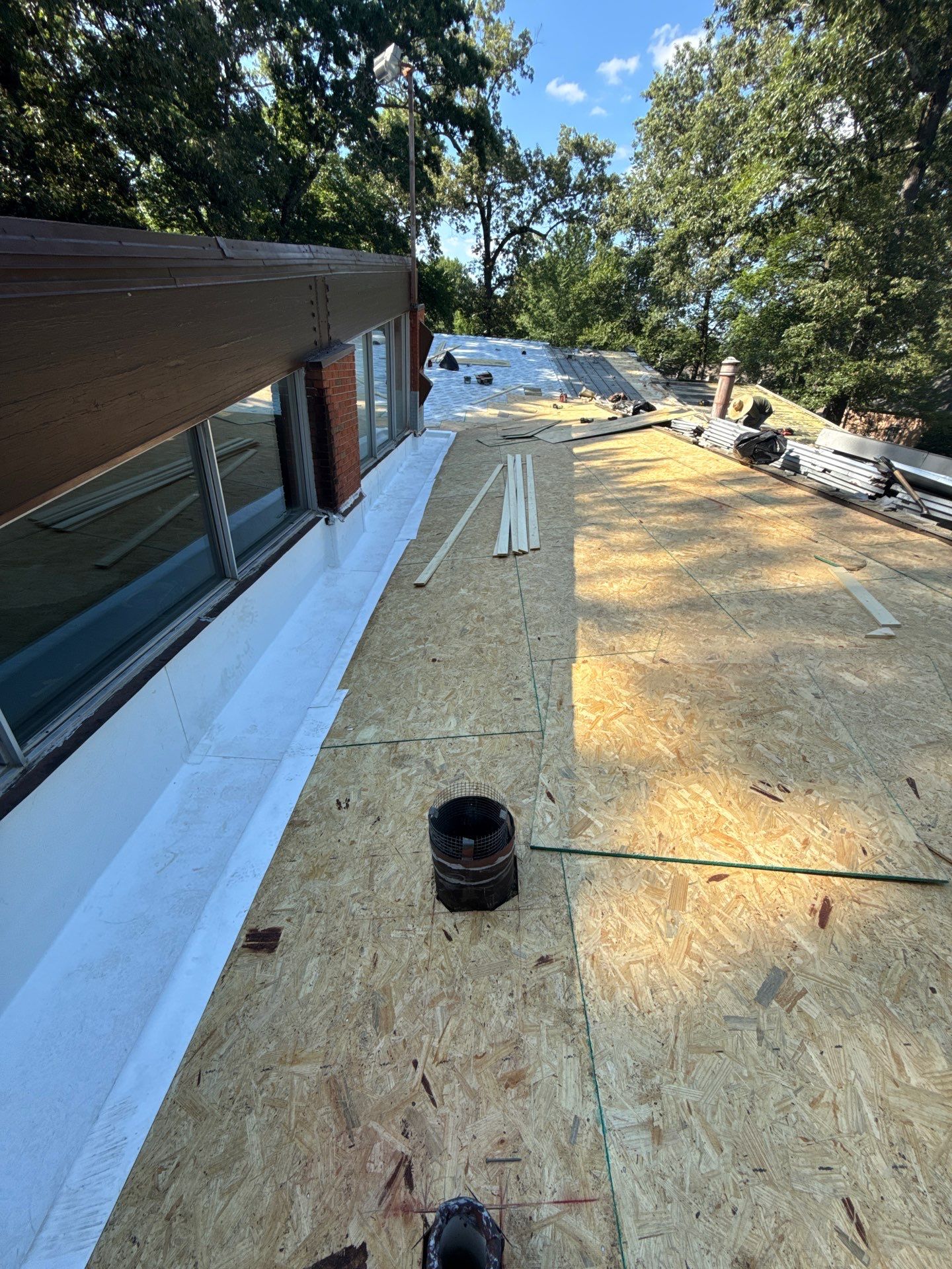 Residential Standing Seam Metal Roof and Membrane Replacement in Memphis by Revival Roofing Services