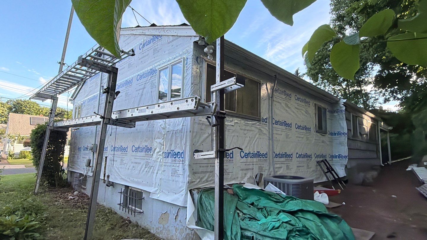 Siding Renewal with Cert Monogram D/4 x 12'6" Clapboard, White by DiGiorgi Roofing and Siding Inc