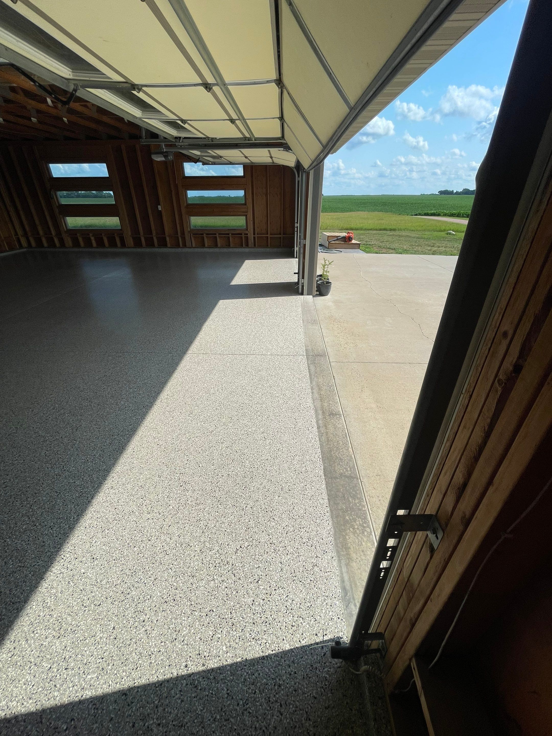 Cabin Fever Coating for Detached Garage in Dell Rapids by Select Painting, Coatings & Garage Cabinets