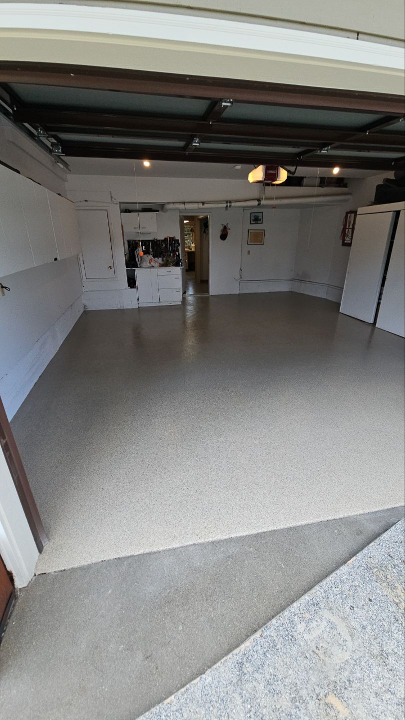 Garage Transformation using Stone/Marble Hybrid by Croc Coatings, LLC
