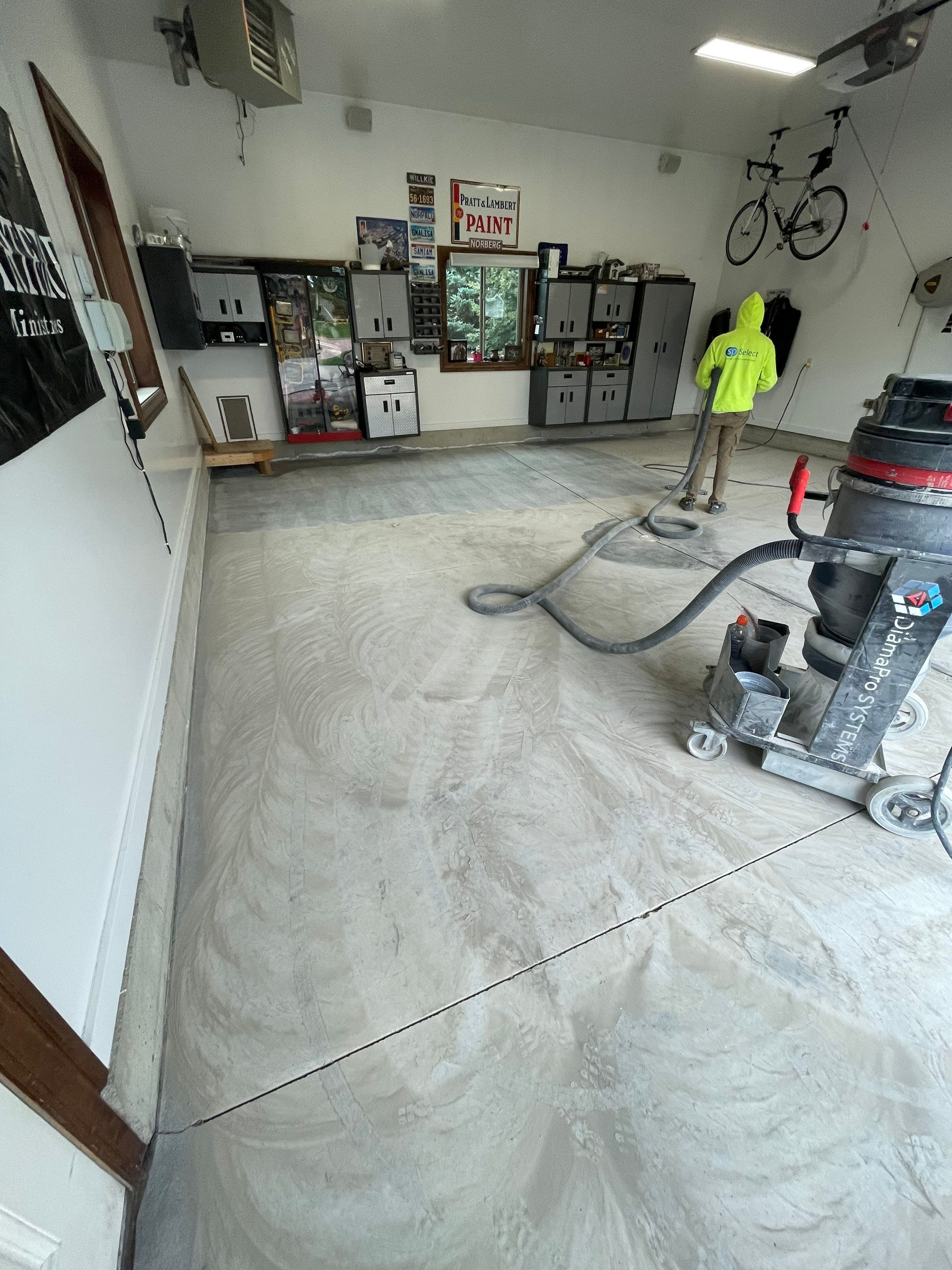 Garage Floor Coating and Domino Flake Finish in Sioux Falls by Select Painting, Coatings & Garage Cabinets