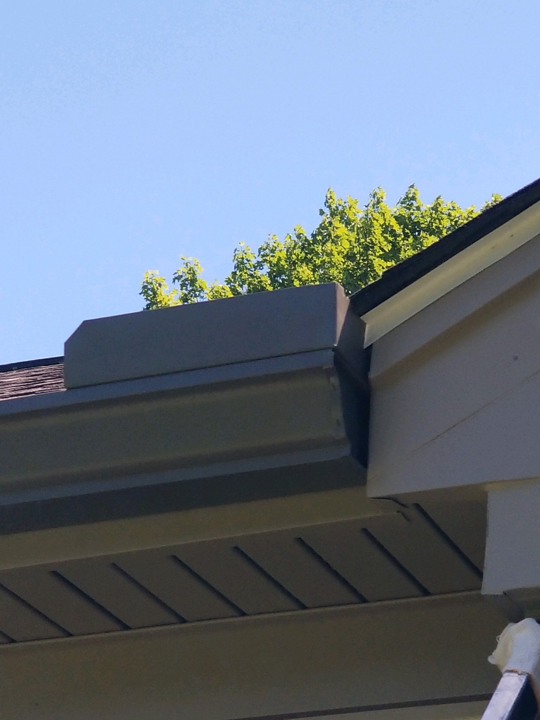 Gutter and Siding Replacement by American Home Contractors
