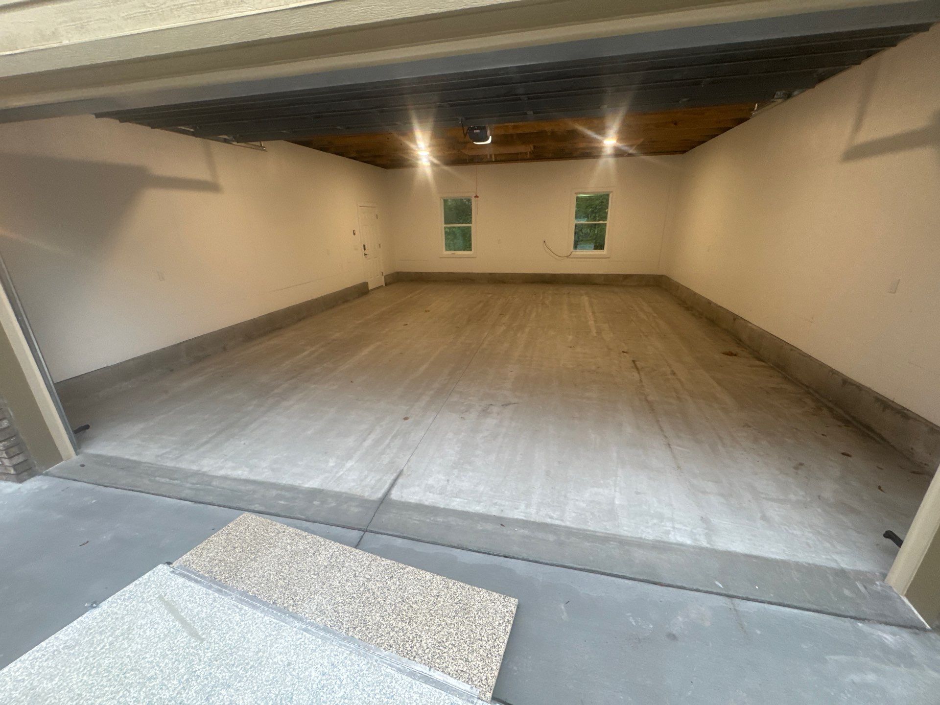 Garage in Gainesville, FL in Sandstone by Cross Creek Concrete Coatings