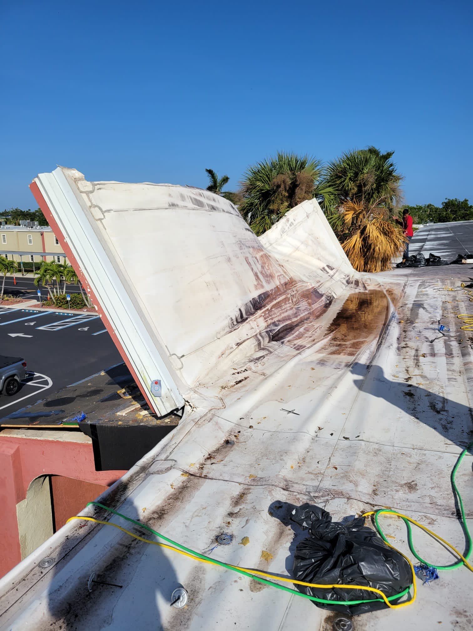Emergency Repair on School from Storm Damage by Four Peaks Roofing