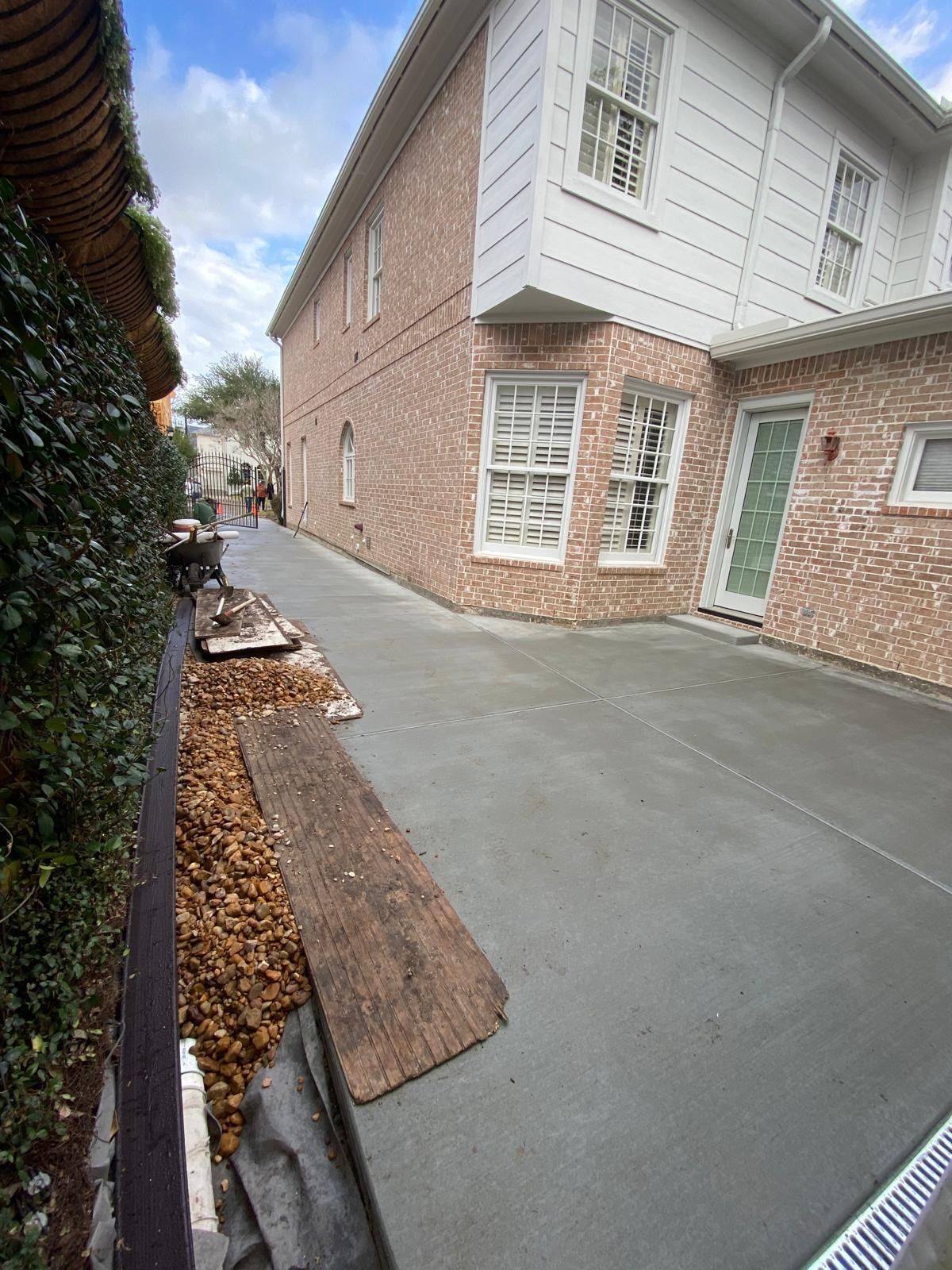 Driveway Concrete Replacement & French Drainage System by Texas Urban Elements