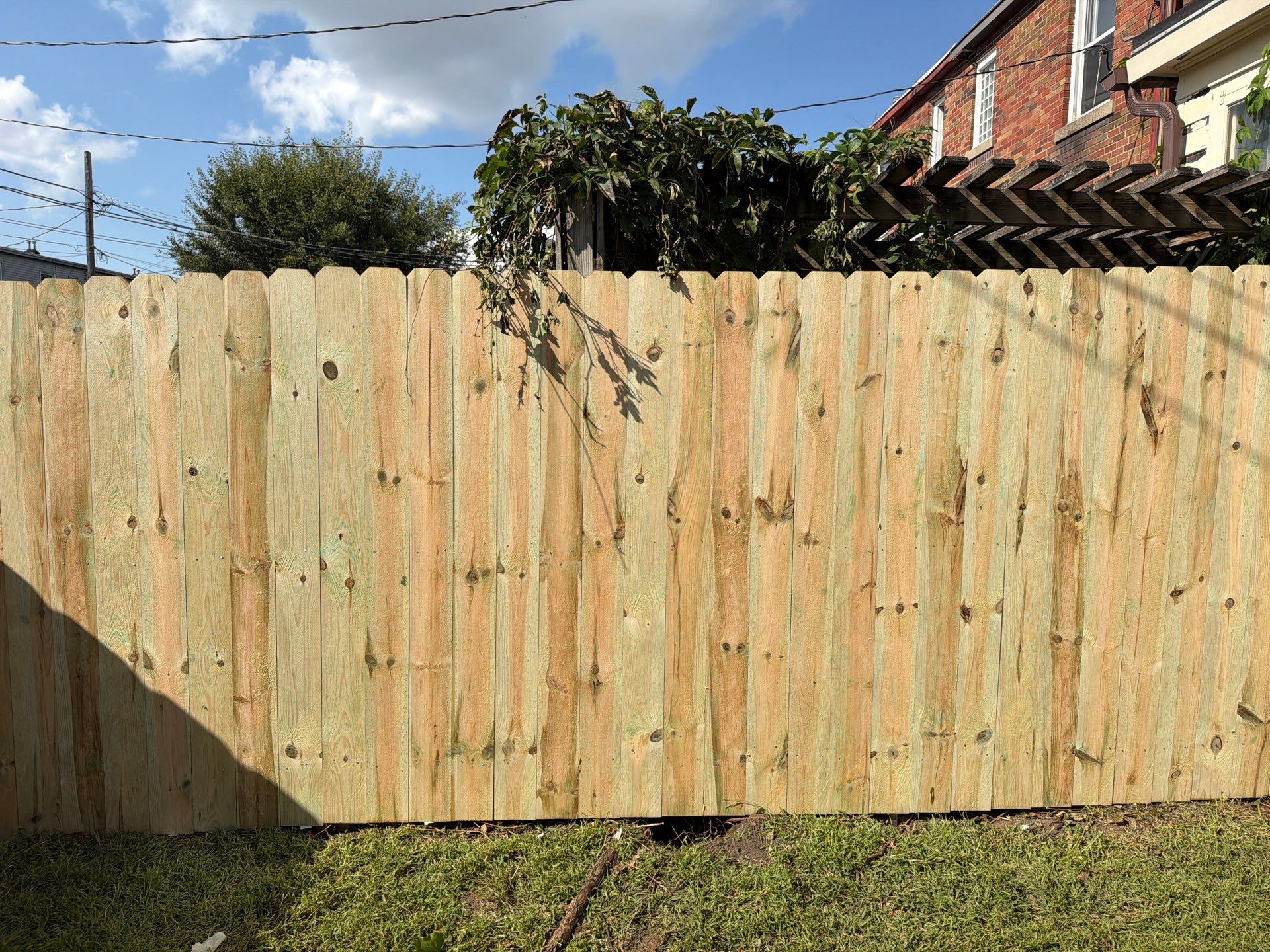 New Treated Wood Privacy Fence and Metal-Framed Gates by Perfect Picket Fence and Stain