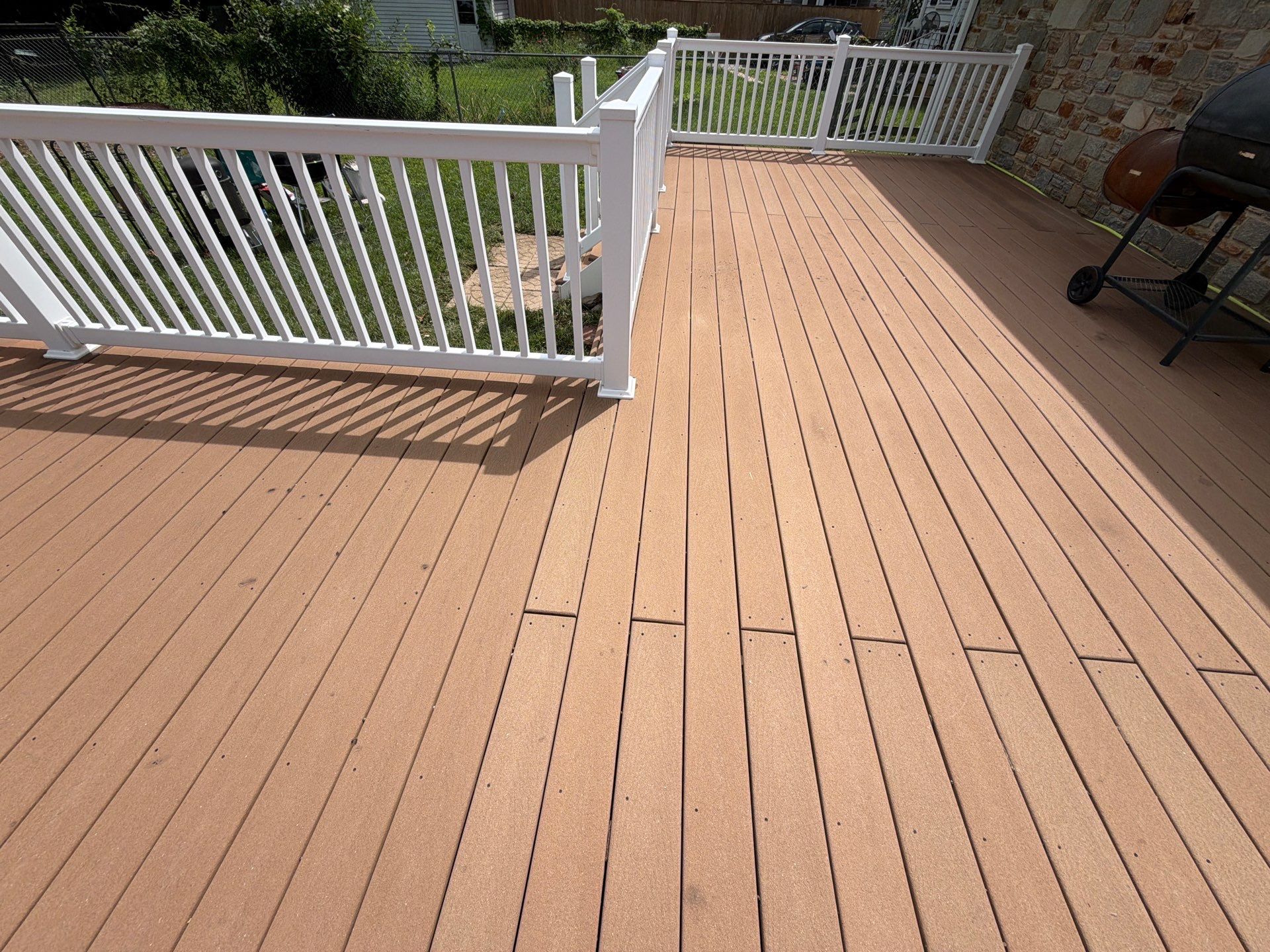 Composite Deck and Flagstone Walkway Washing by Baltimore Pressure Washers Inc.
