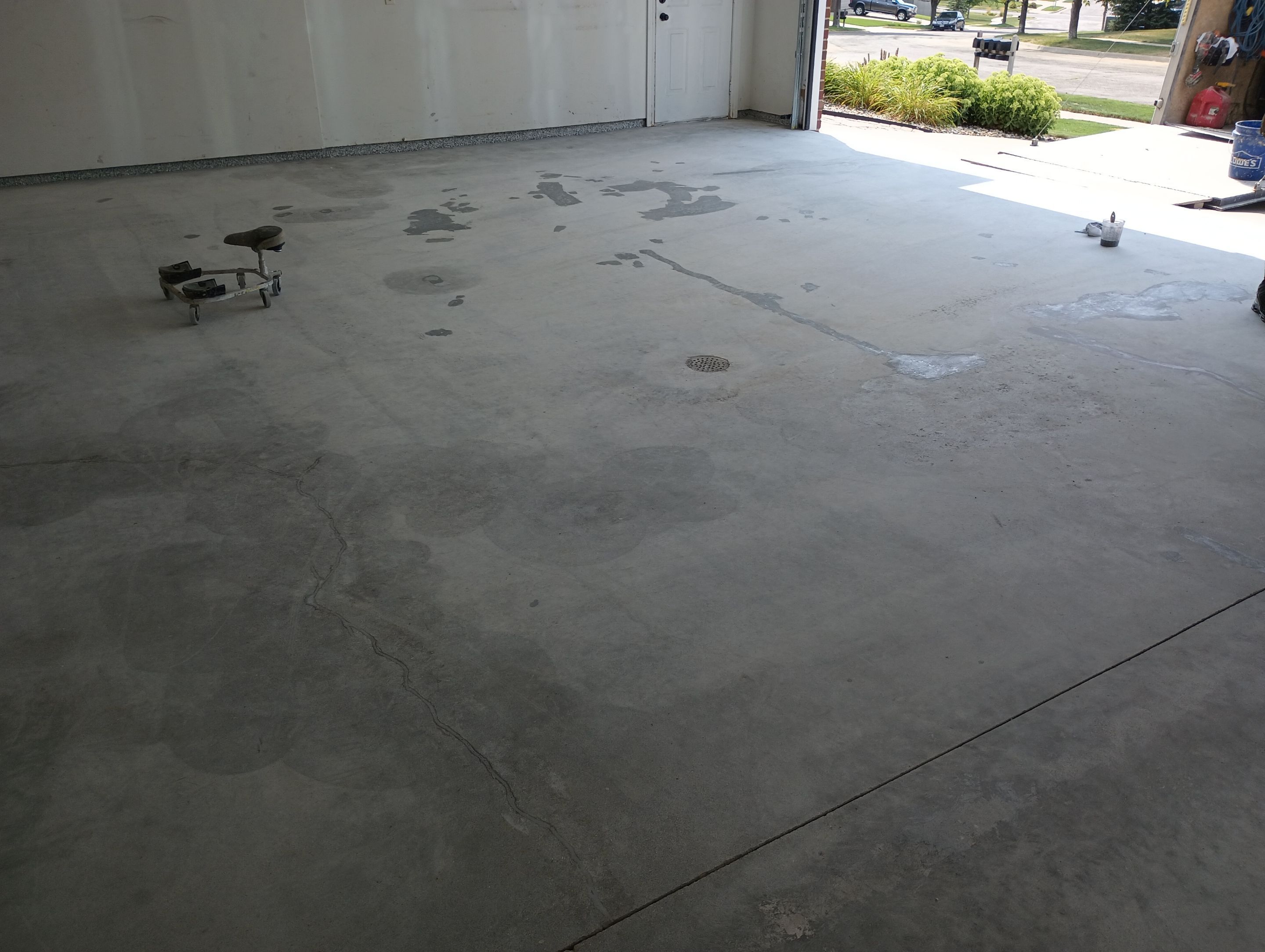 Garage Concrete Coating Installation in Sioux Falls Using Tidal Wave Finish by Select Painting, Coatings & Garage Cabinets