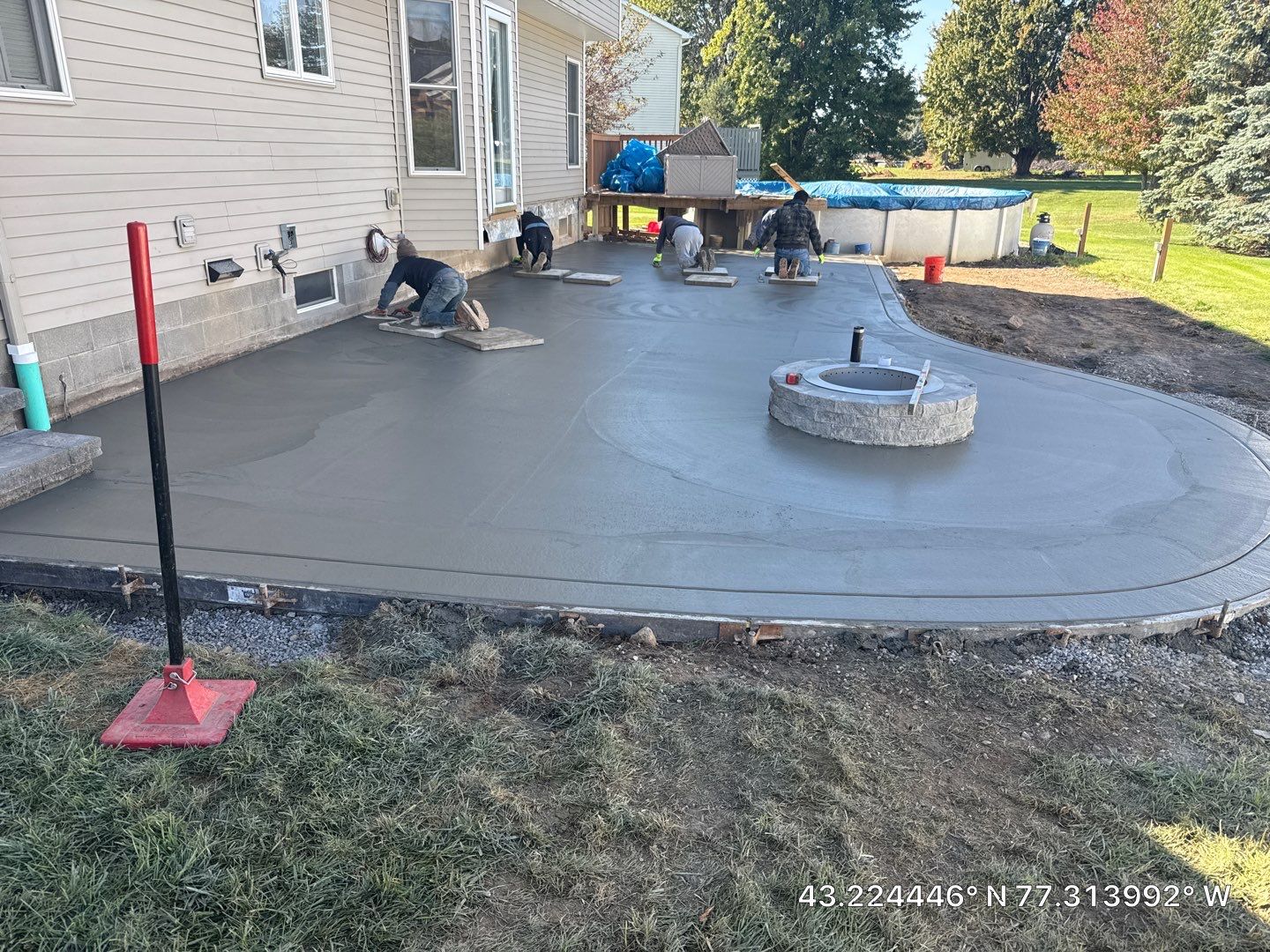 Oxford slate stamped concrete patio  by NG Masonry & Construction LLC