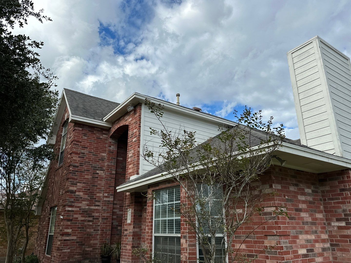 Residential Roofing Installation using Certainteed Landmark Moire Black by Galvan Roofing and Construction