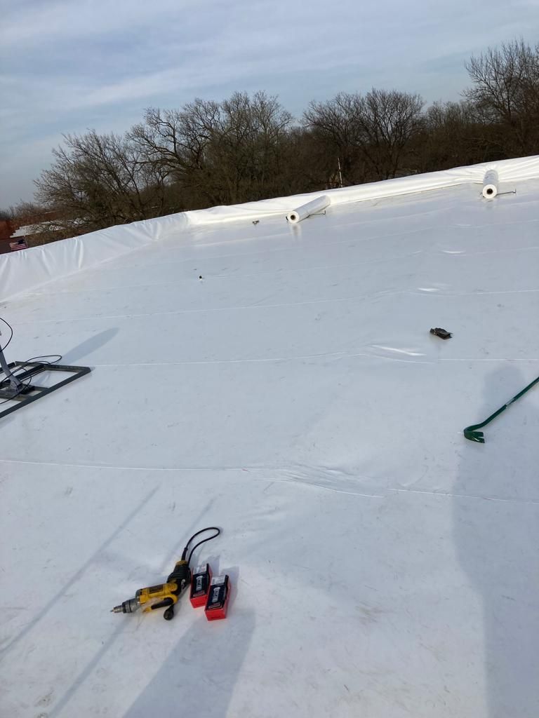 Roof Recover on a downtown building in Lake City  by Grell Roofing, LLC