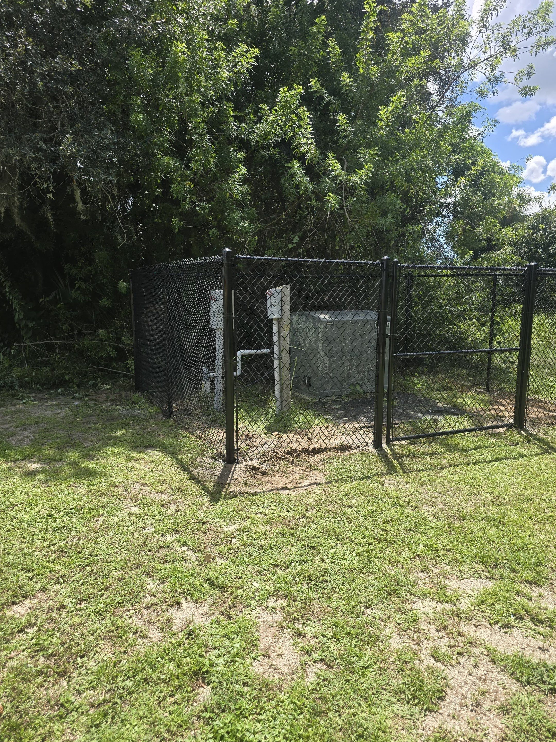 Commercial Black Chain Link Fence Installation in North Port by True Fence LLC