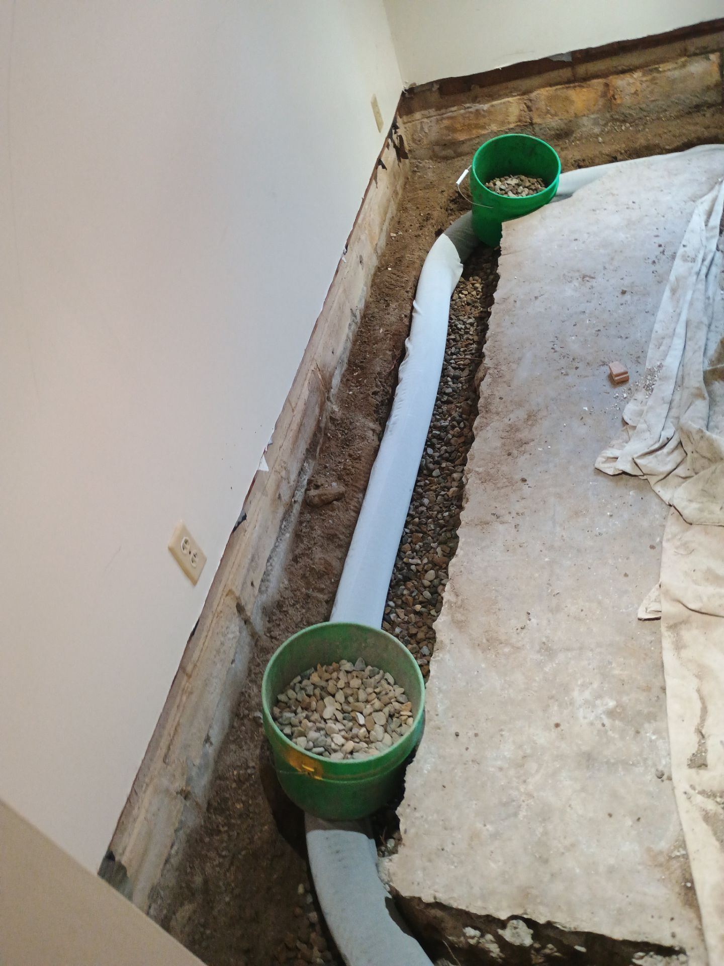 Completing the Connection for Lisa's Drain Tile System by Waterproofing Northeast