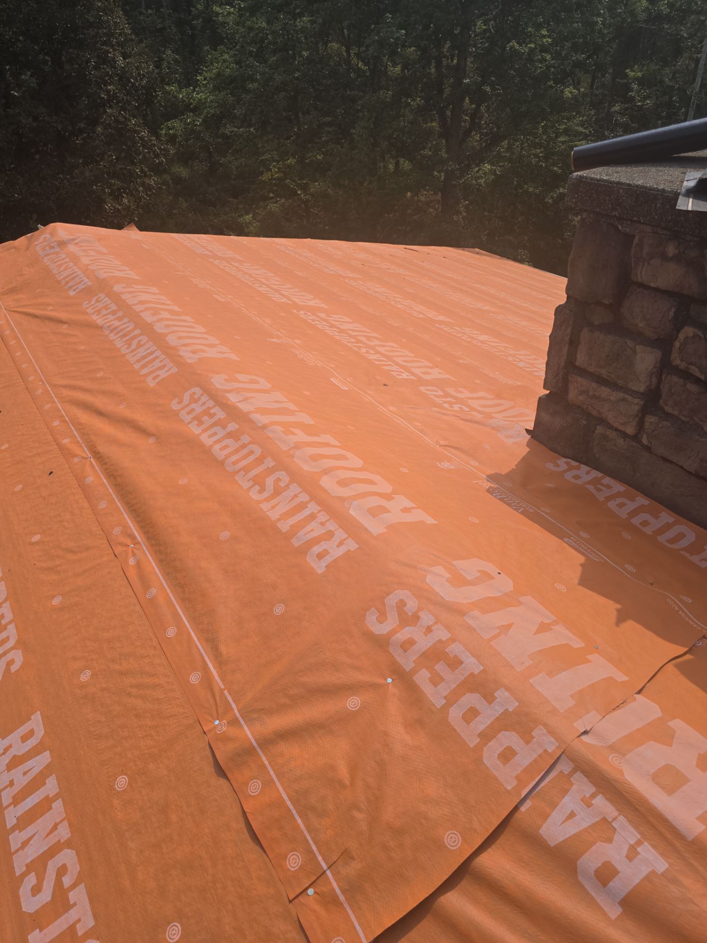 Residential Roofing Installation using Metal by Rainstoppers Roofing