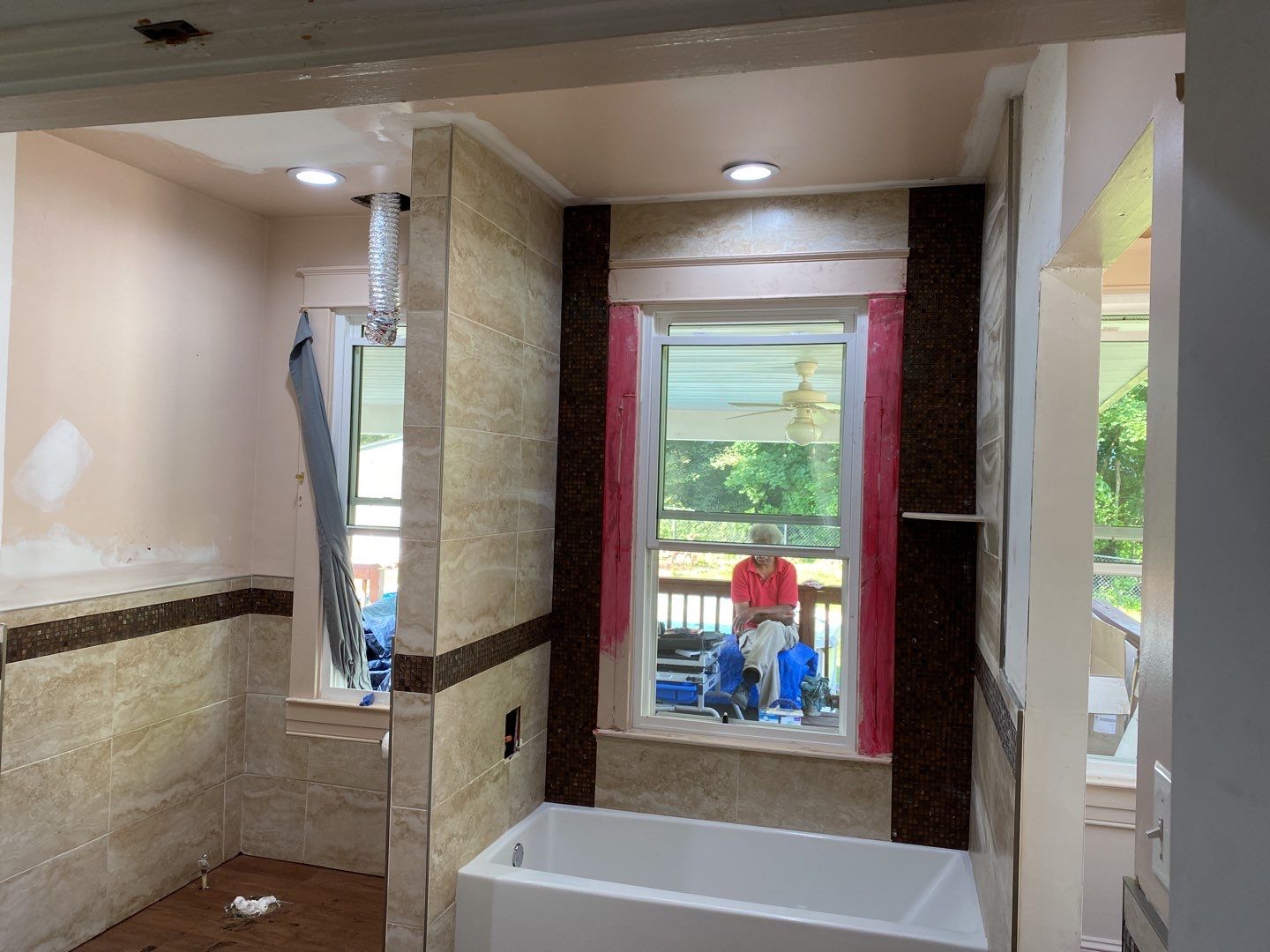 Bathroom Remodel using New Bathroom Tile and Tube by Alpha Design Services
