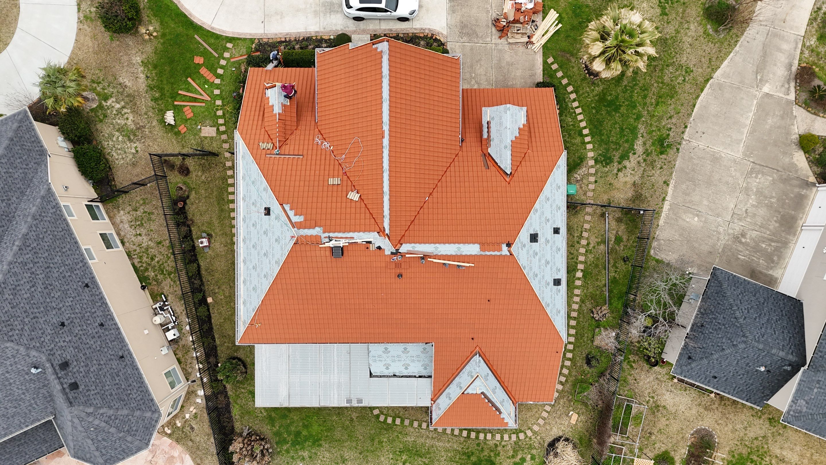 Stunning transformation using DECRA Villa Tile!  by Core Four Roofing