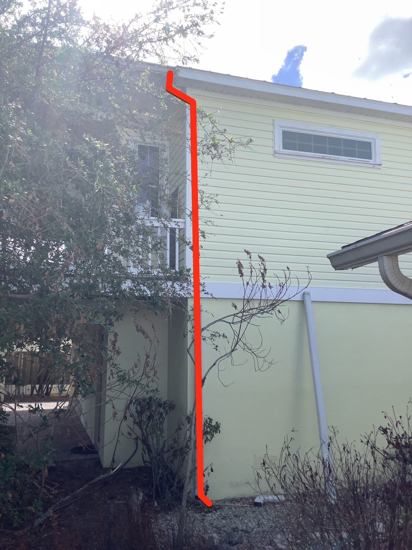 White Gutters with Matching Downspouts in Sarasota FL by Gutter Professors