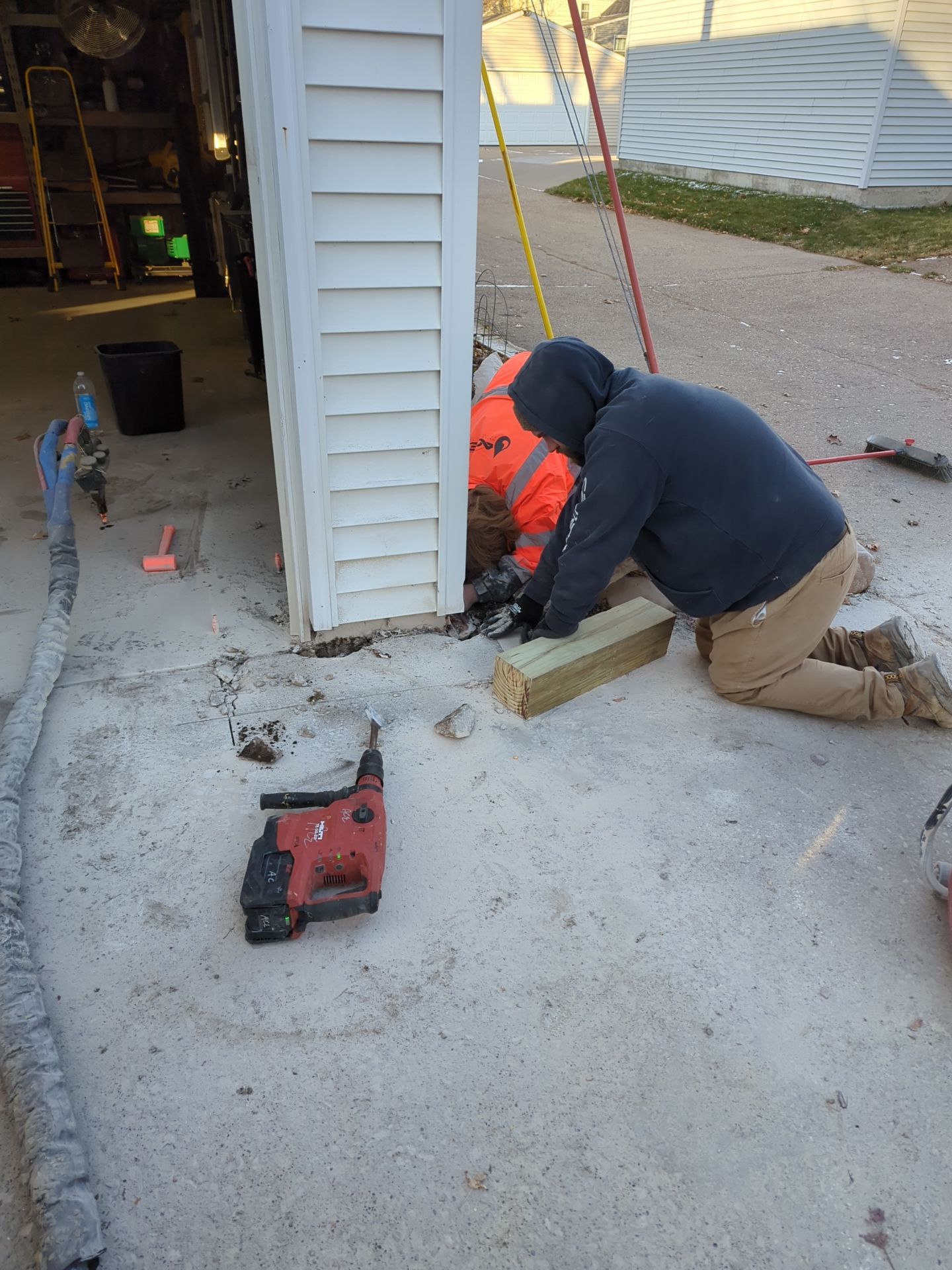 Concrete Raising using Polyfoam Injection and Bottle Jacks by ACE Waterproofing & Basement Solutions
