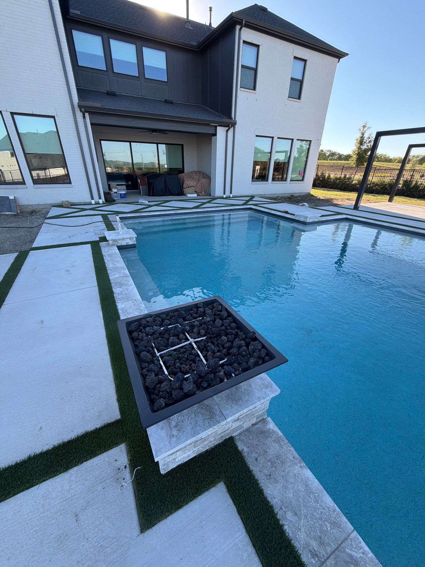 Modern Geometric Pool with Raised Spa, Tanning Ledge and Fire Bowls by Pinnacle Pools and Spas - DFW