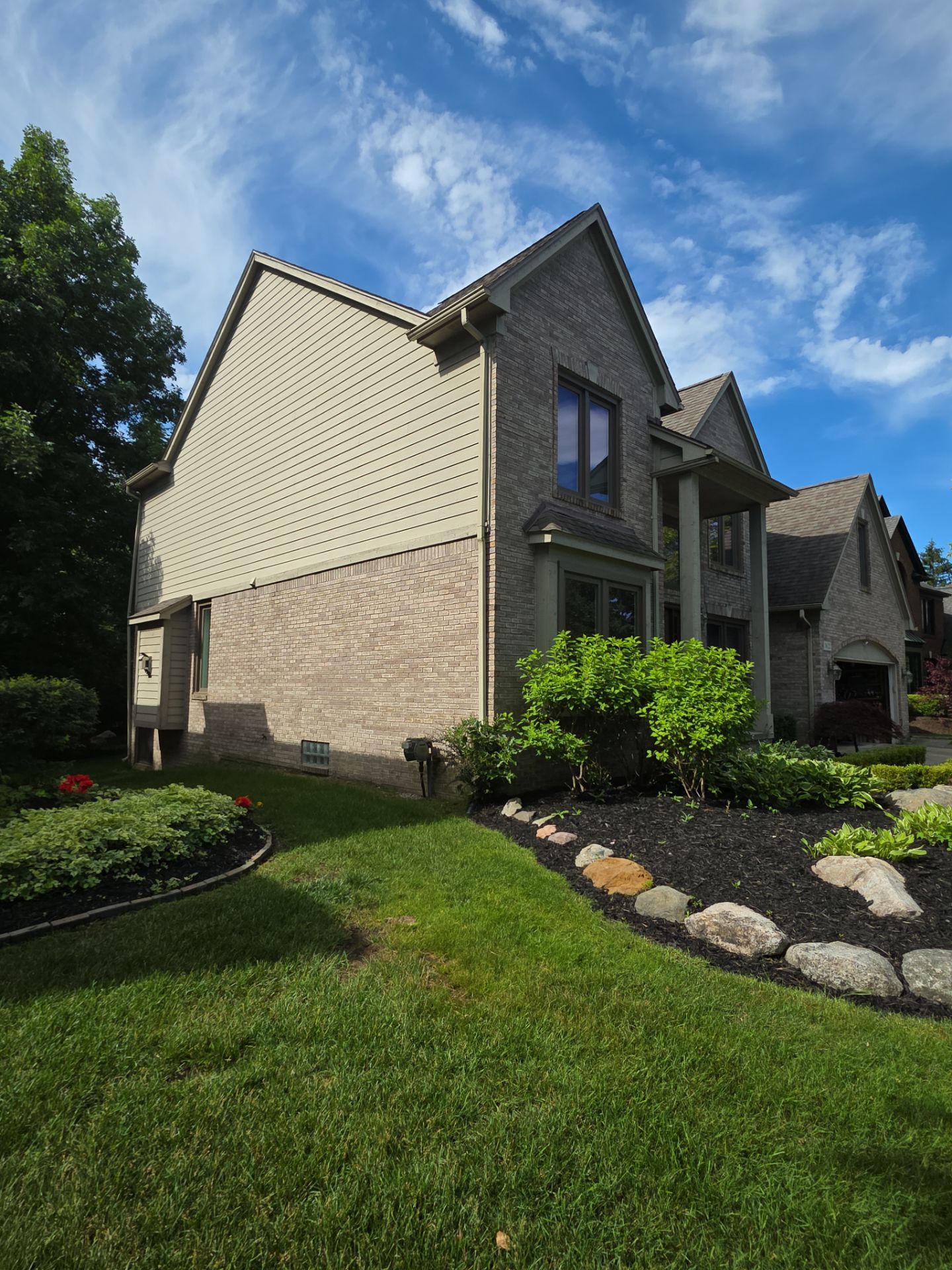 Exterior Wood Trim and Siding Replacement in Rochester by Top Shelf Painter