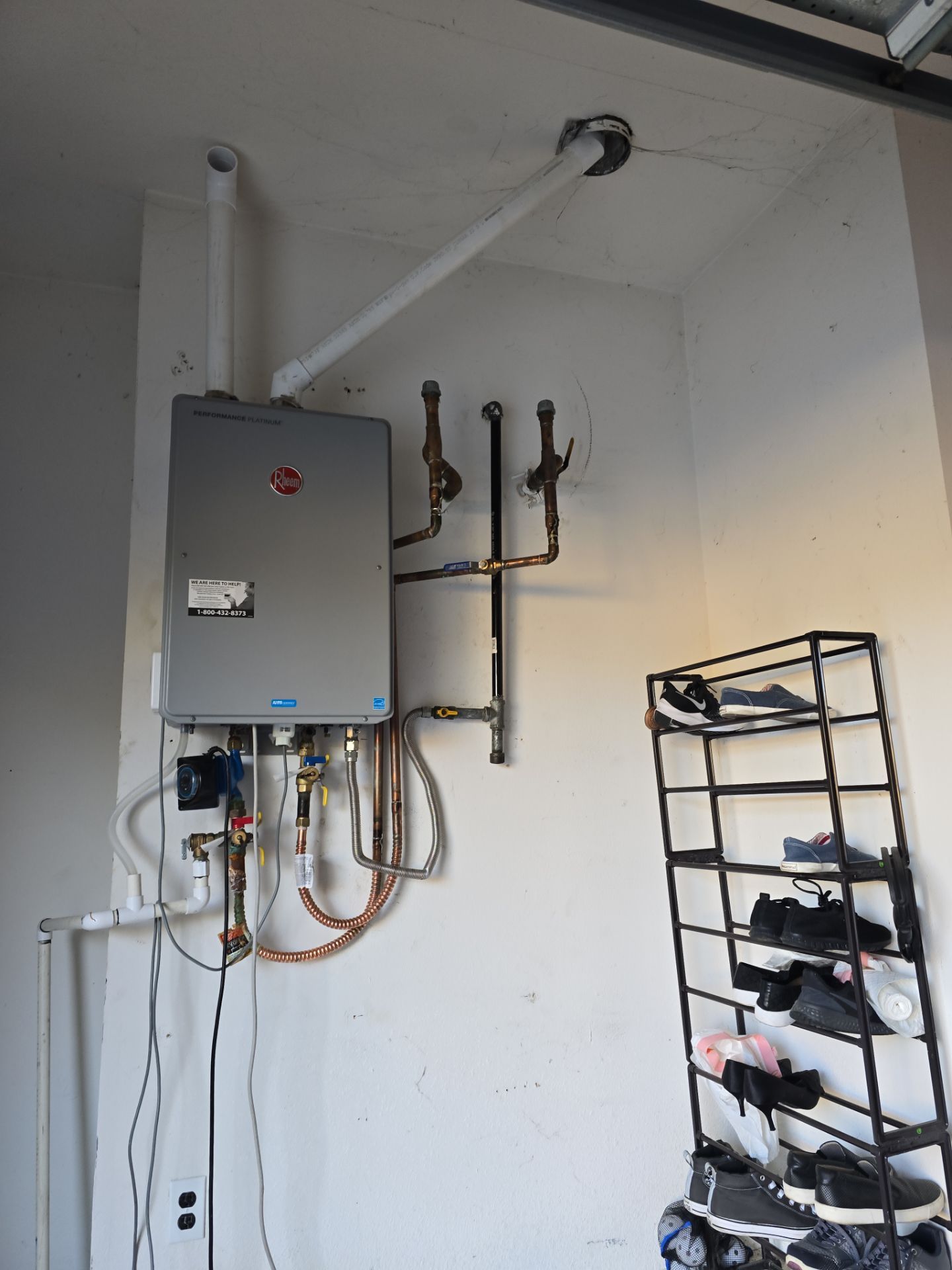 Installing a New Tankless Water Heater by Us Plumbing 
