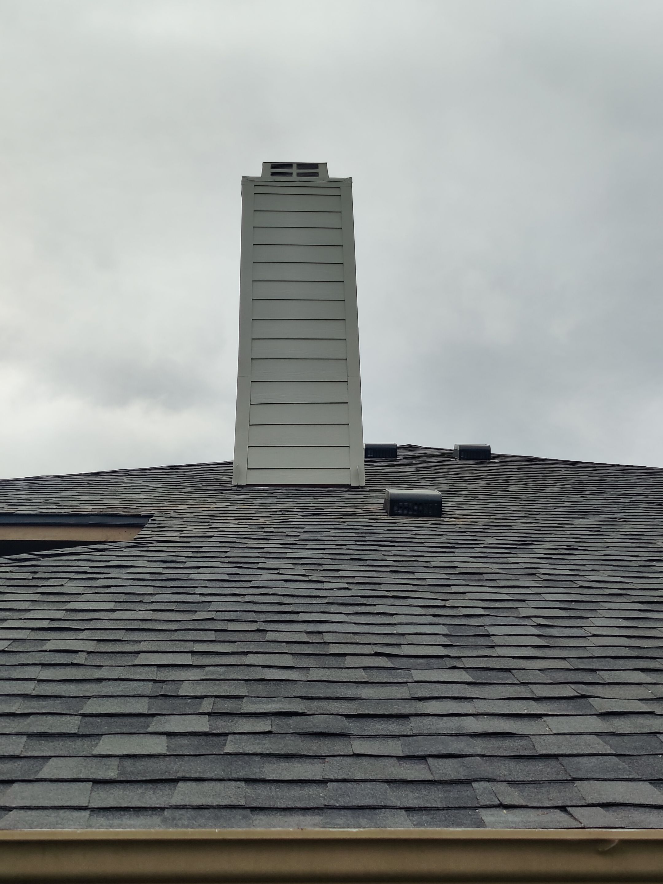 Residential Roofing Installation using Certainteed Landmark Moire Black by Galvan Roofing and Construction