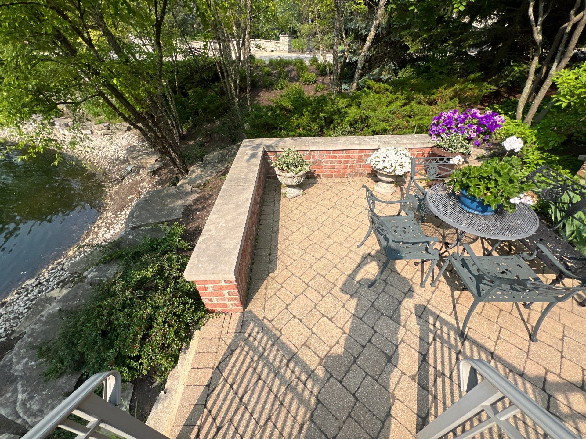 Brick paver cleaning sanding and sealing by Northern Power Washing LLC.