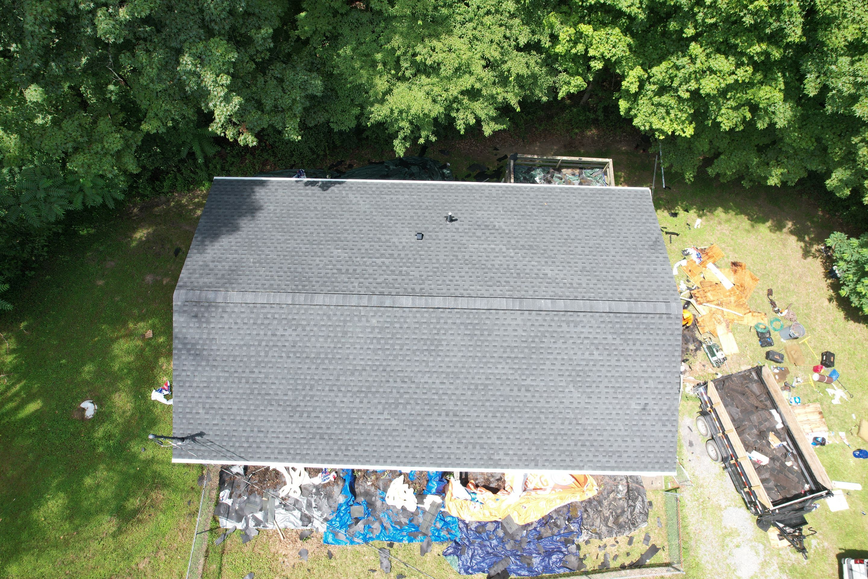 Residential Roofing Installation using GAF Timberline HDZ Charcoal by Rainstoppers Roofing