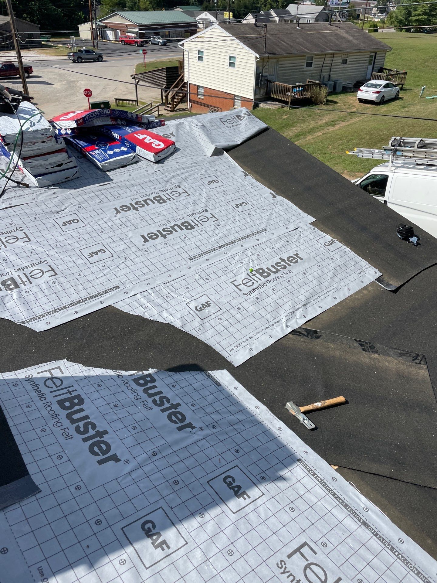 Residential Roofing Installation using GAF TImberline HDZ Hickory by Rainstoppers Roofing