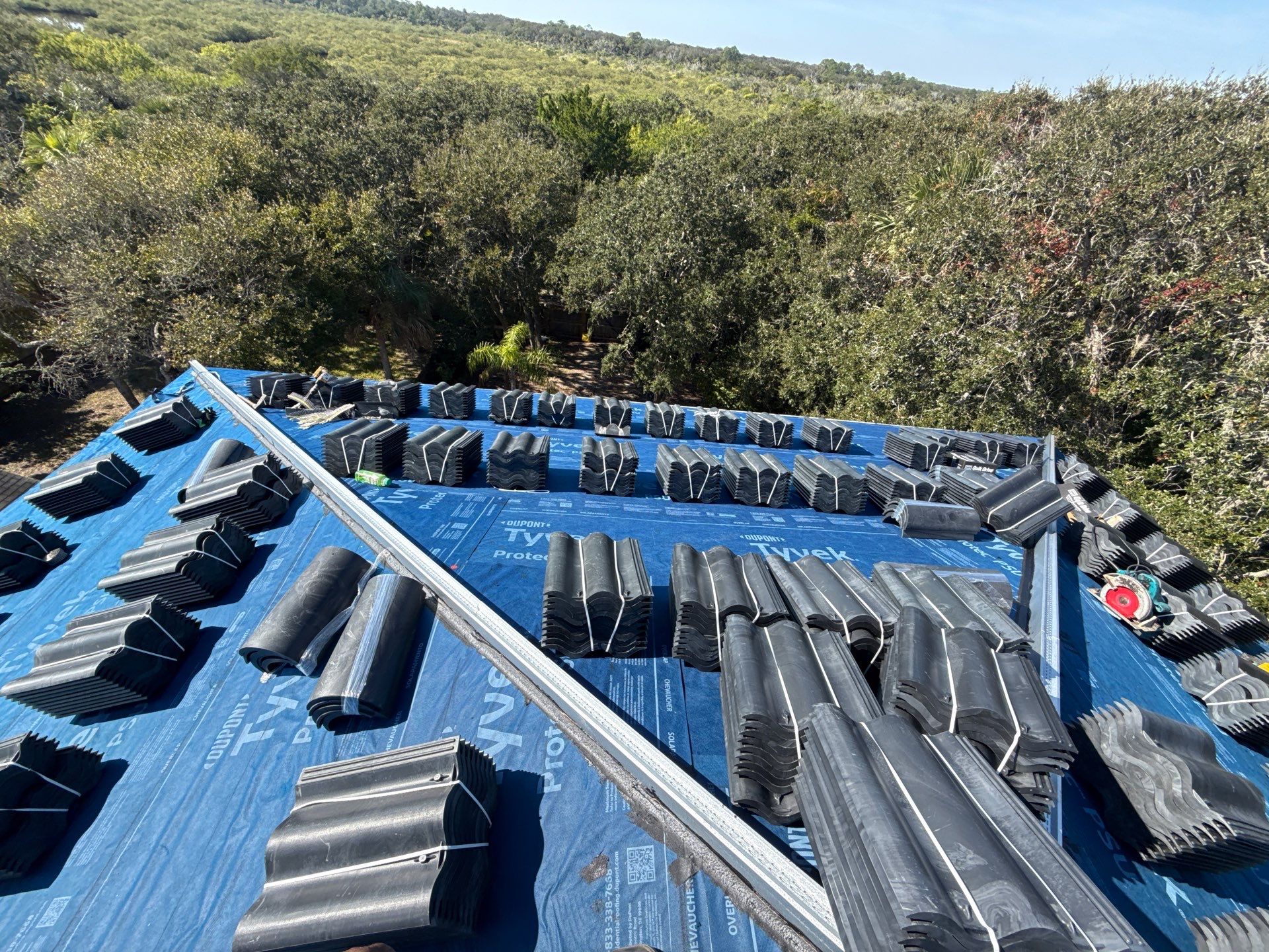 Flagler Beach Residential Tile Roof Replacement with Dark Barrel Tiles by Fortified Roofing Solutions Corp.