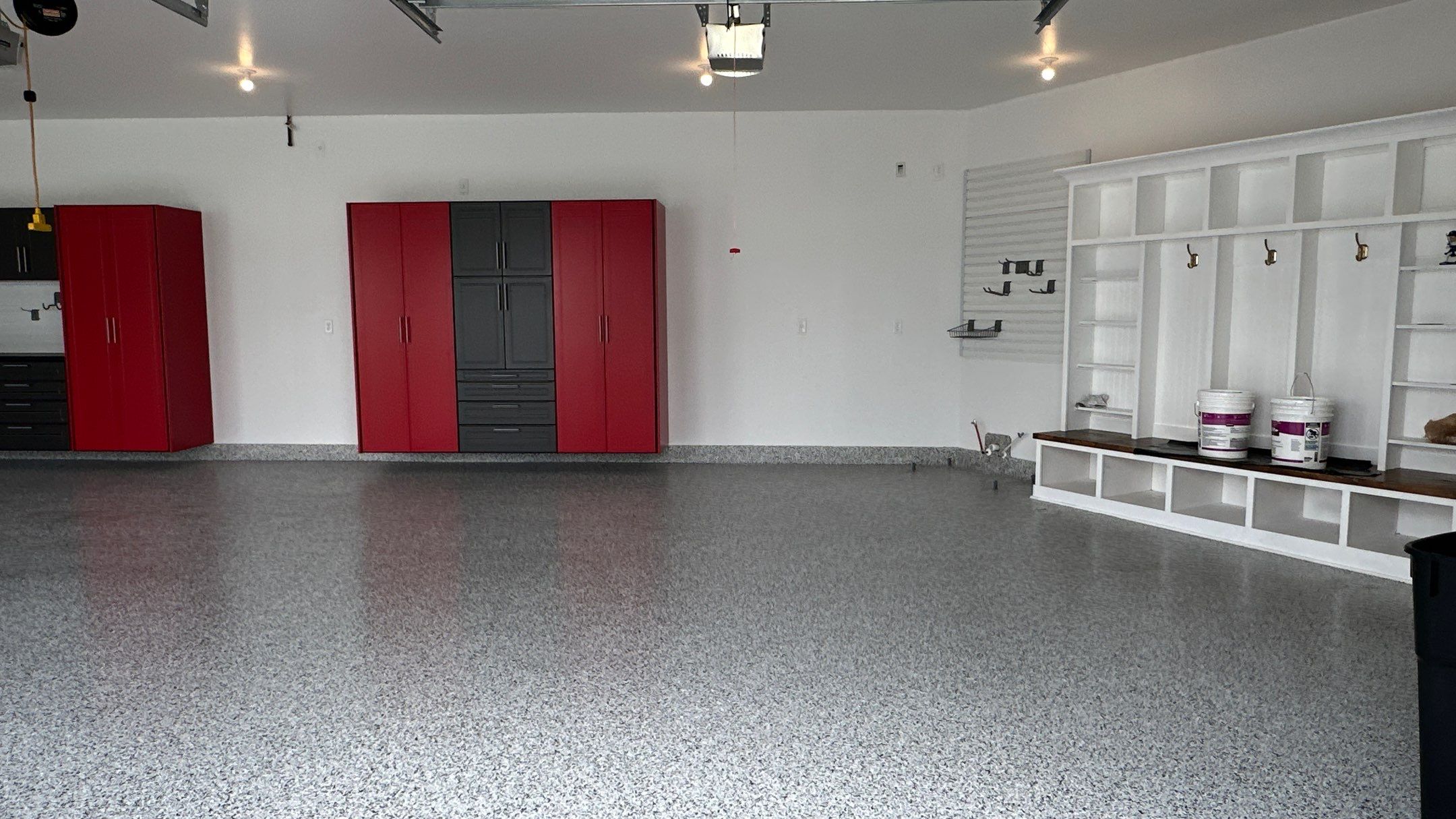 Louis P. transformed their garage into the garage of their dreams by Banner Garage