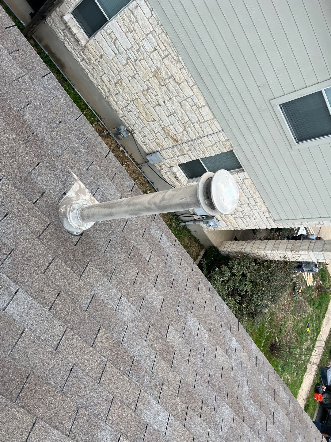 Wind damaged roof replacement by Oakwood Roofing and Construction, LLC