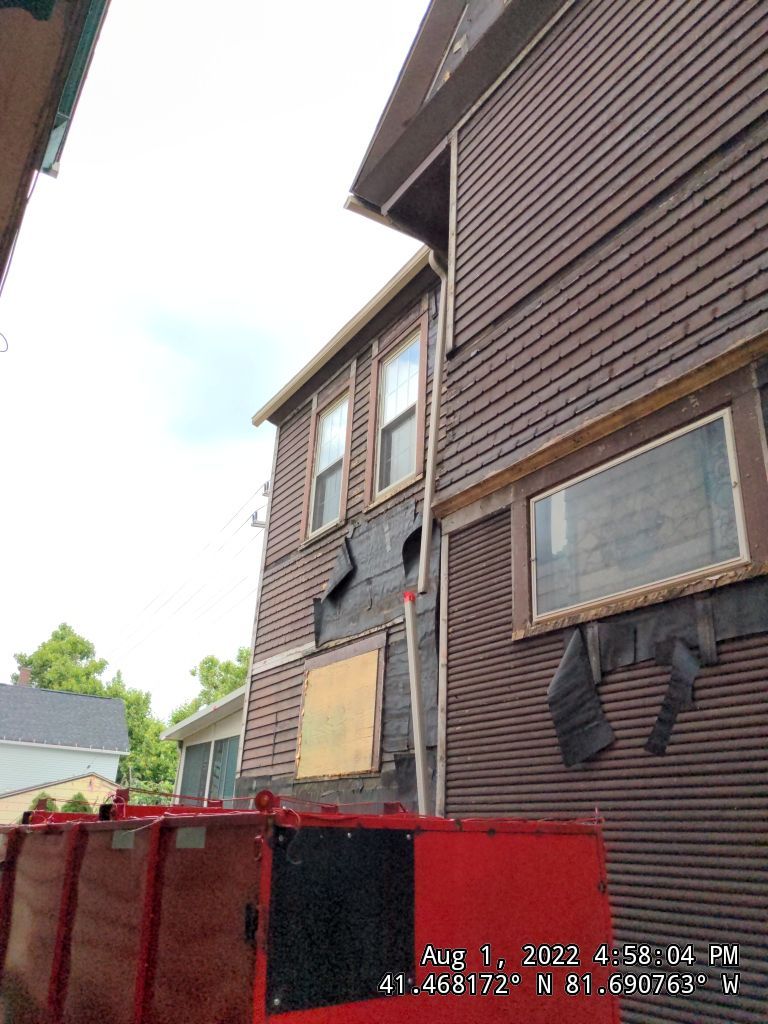 Fire damaged home in Tremont by Absolute Roofing and Construction