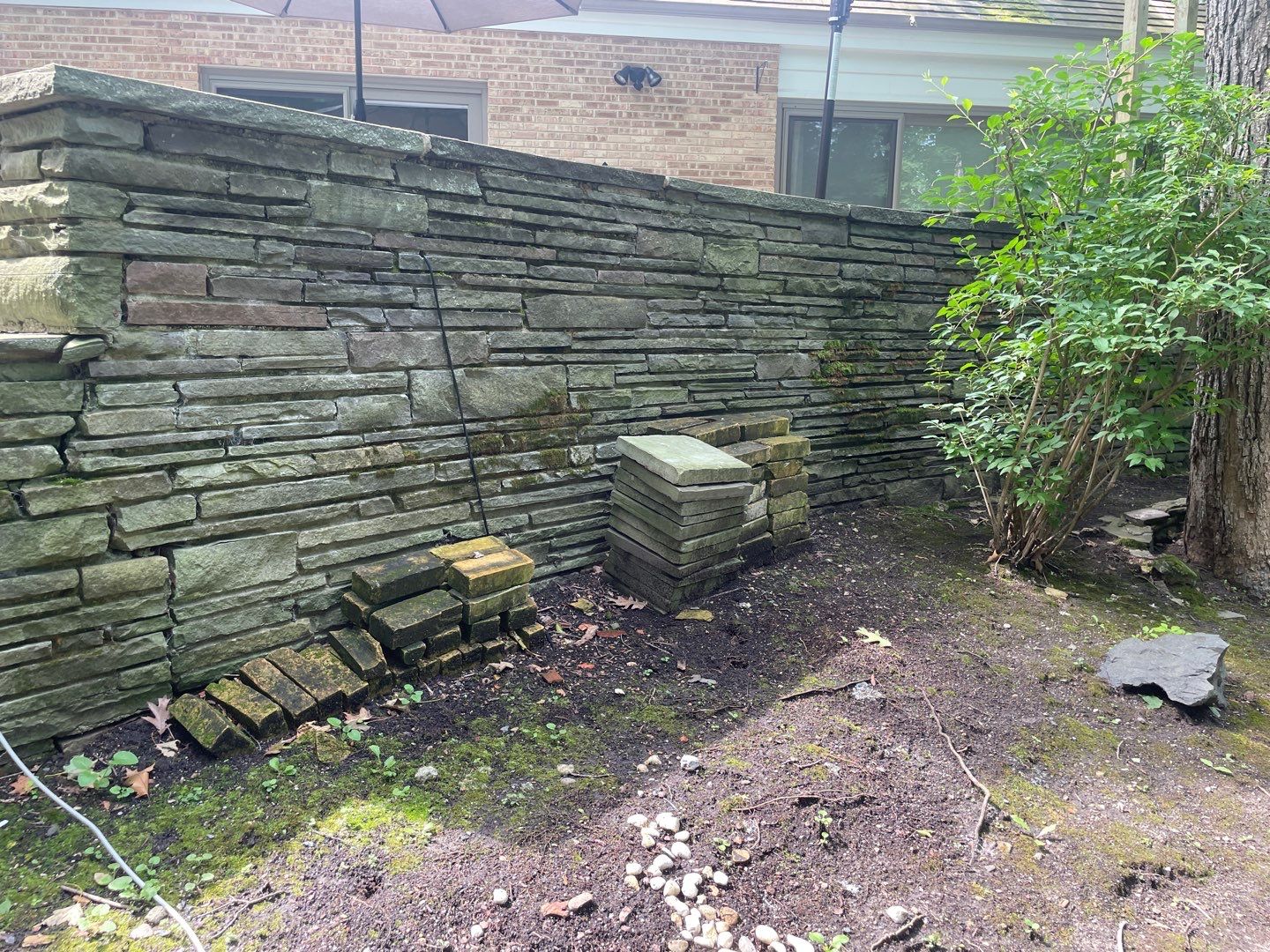 Bluestone patio cleaning by Northern Power Washing LLC.