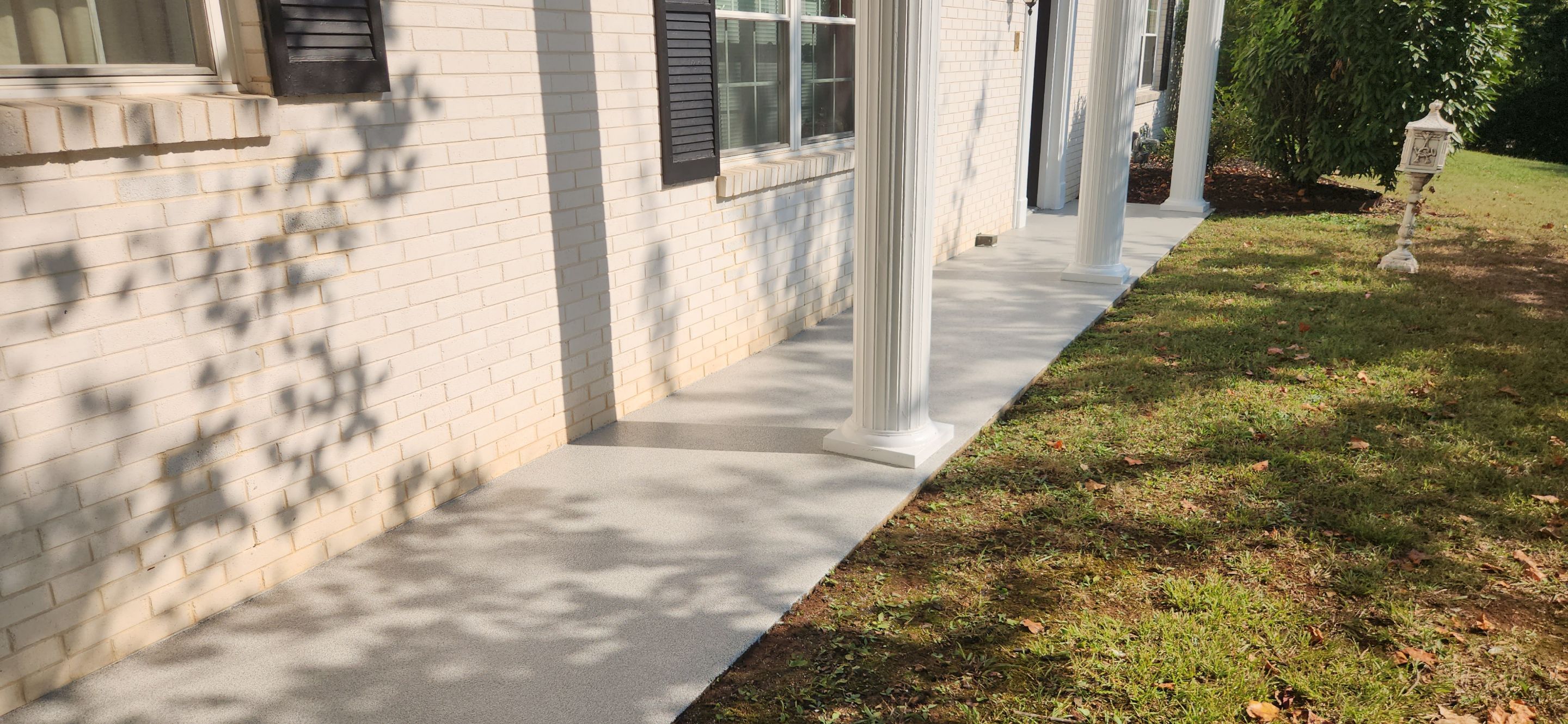 Sidewalk & Garage using Dovetail by Elite Floor Solutions