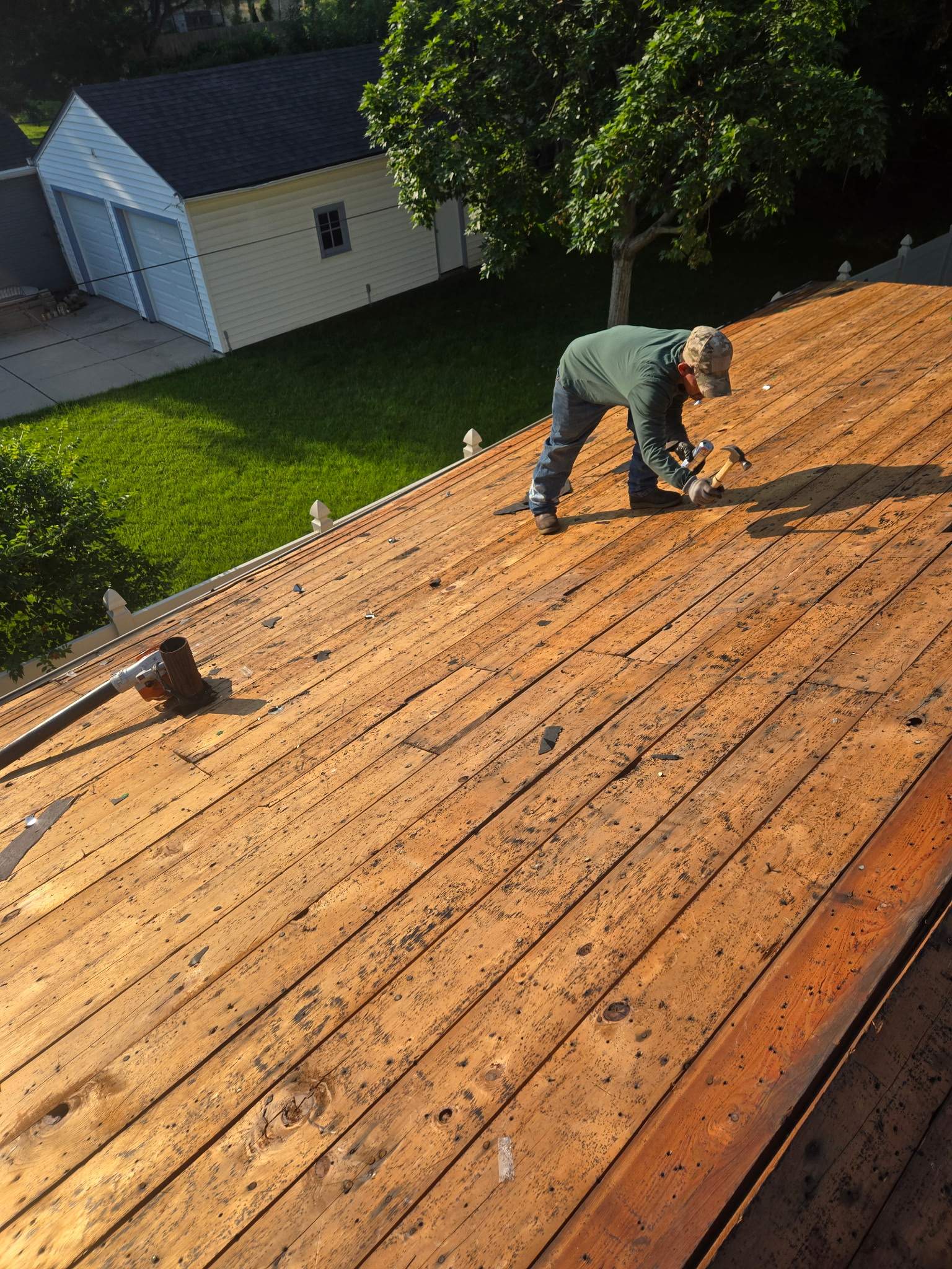 Asphalt Architectural Shingle Installation and Roof Deck Repairs in Lincoln by Star Home