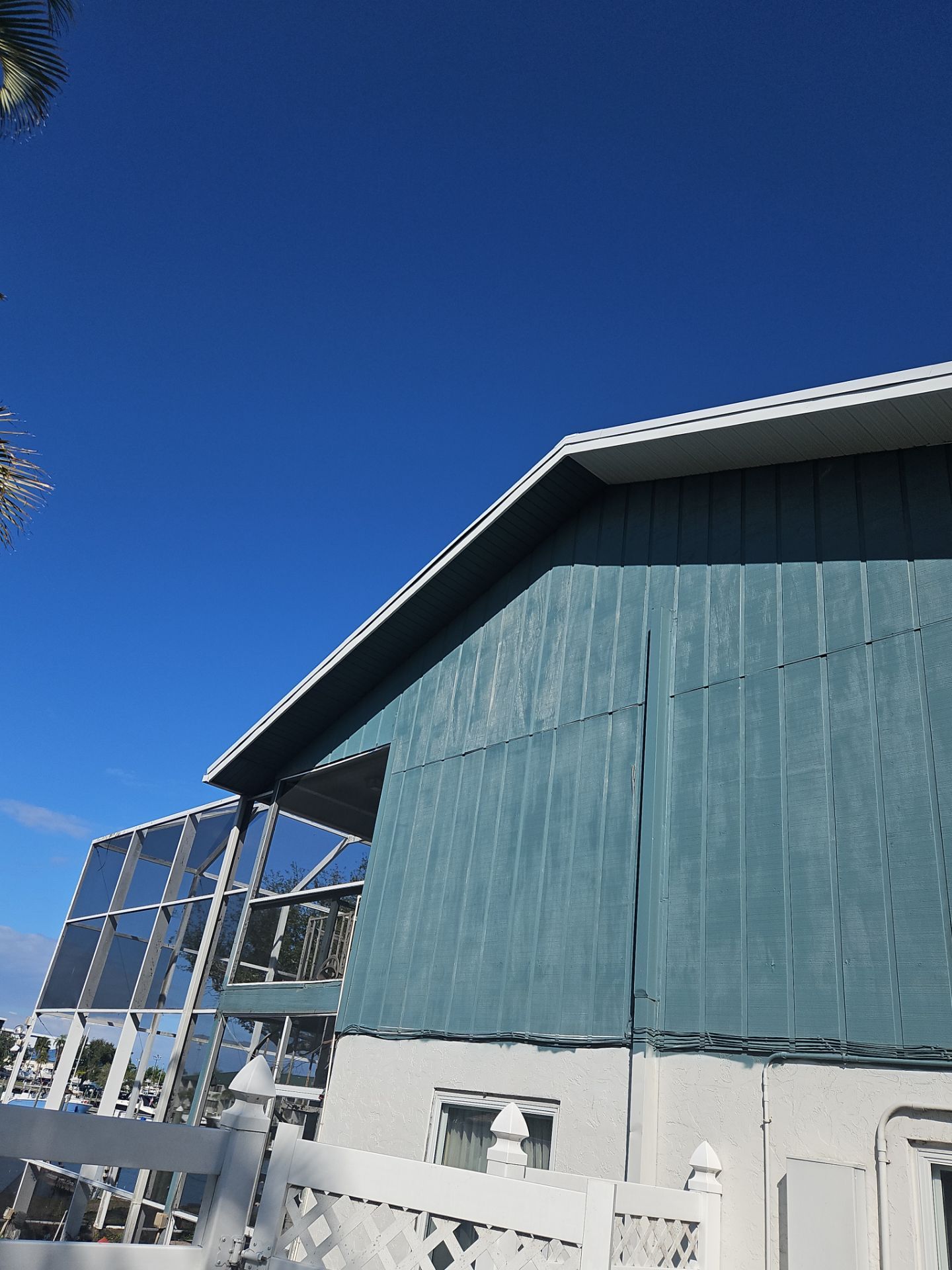 K-Style Seamless Gutter Installation using White Seamless Gutters in Sarasota FL by Gutter Professors