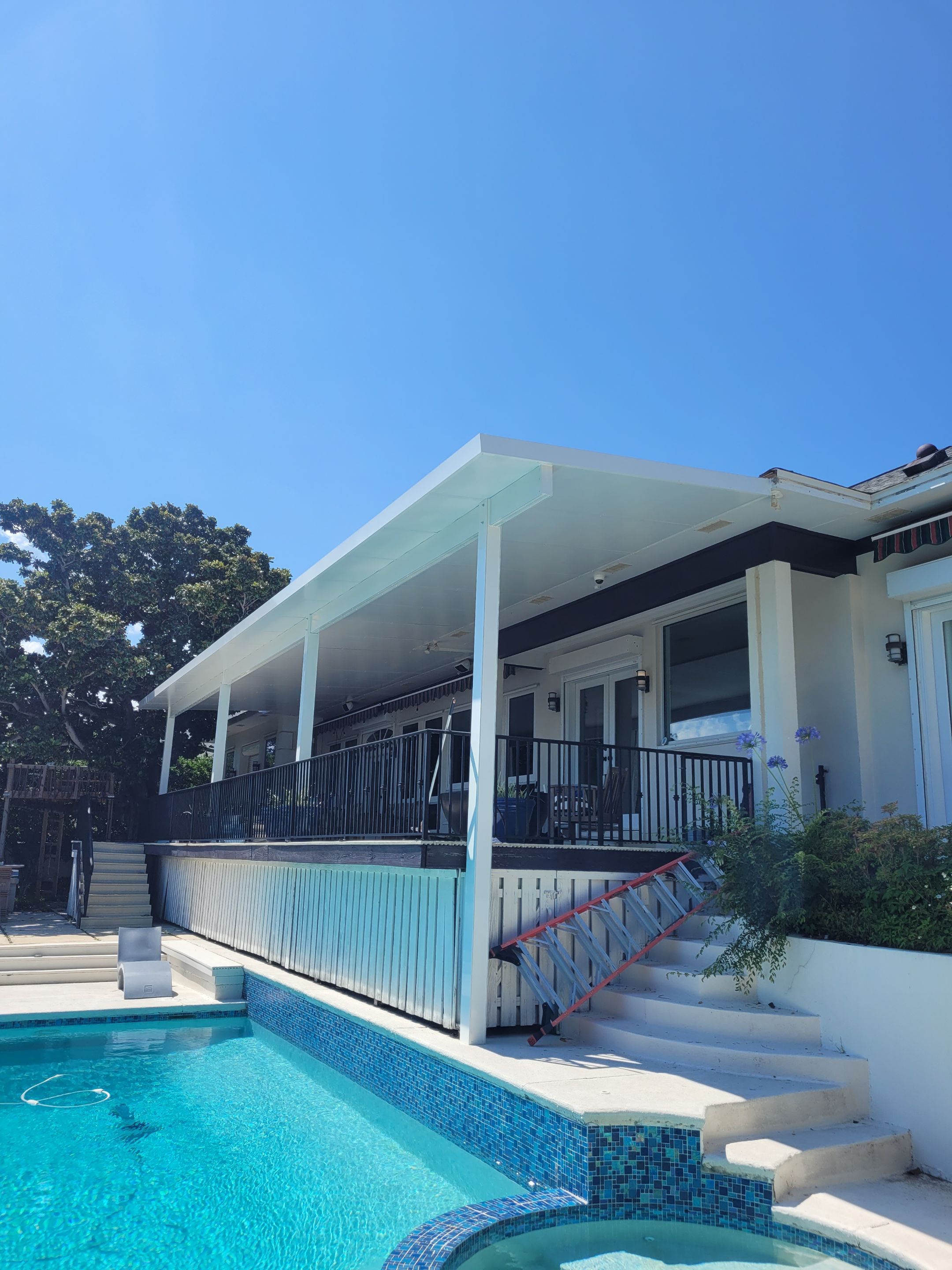 Poolside Colorbeam Patio Cover in Gulf Breeze by Titan Sunrooms