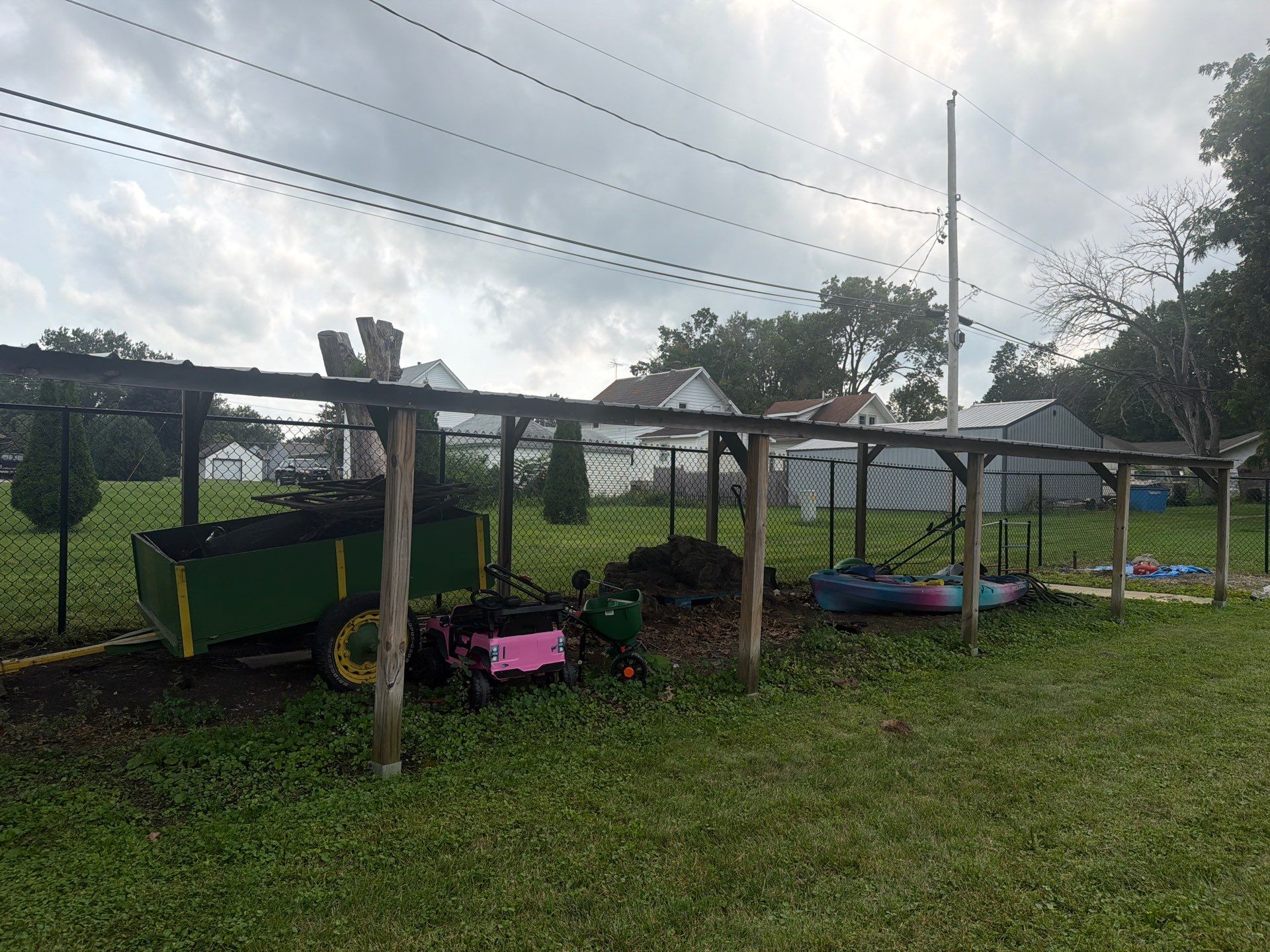 Residential Black Chain Link Fence Installation in Reinbeck by Perfect Picket Fence and Stain