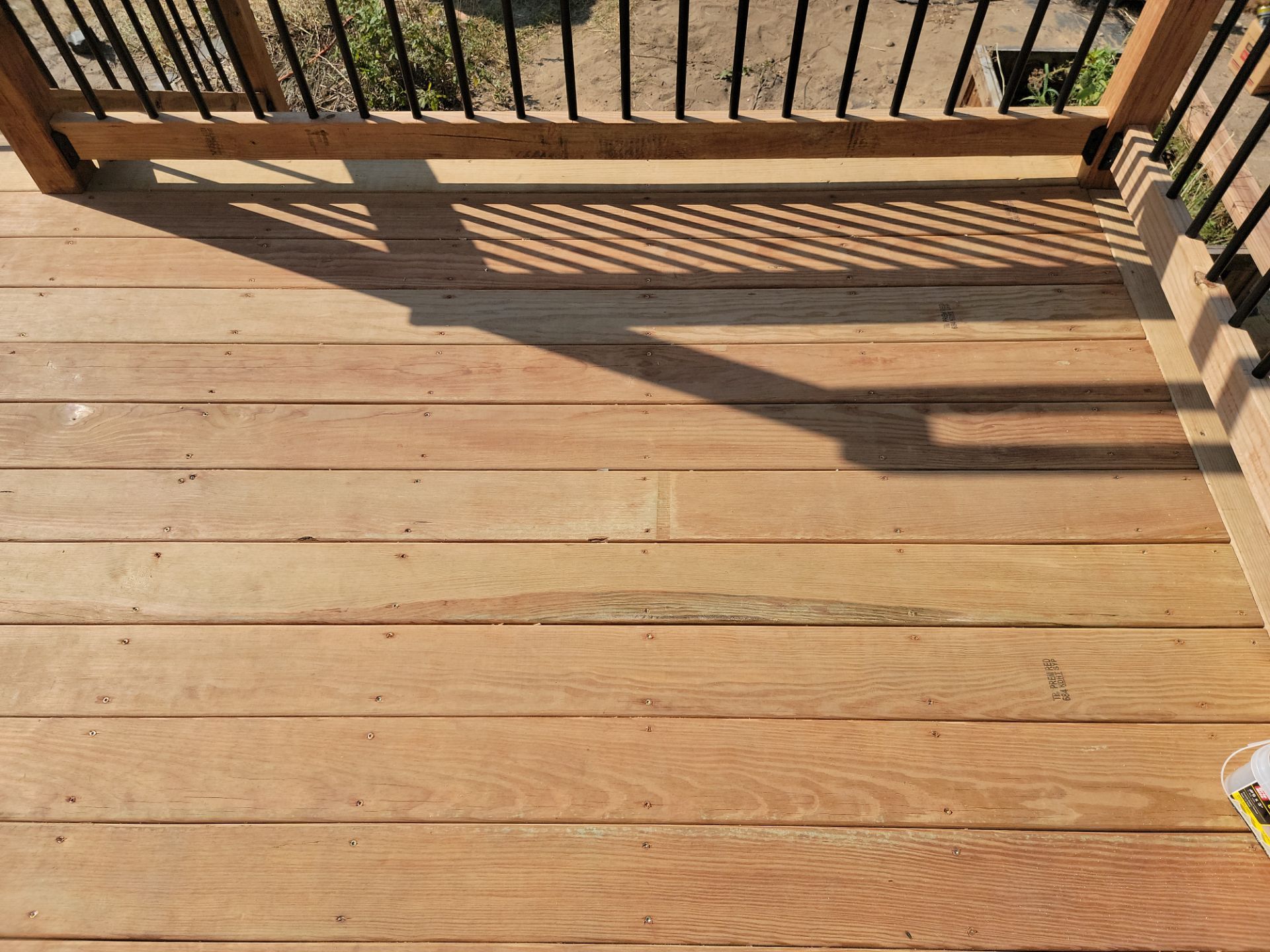 TREATED LUMBER DECK  by Avalon Roofing and Exteriors
