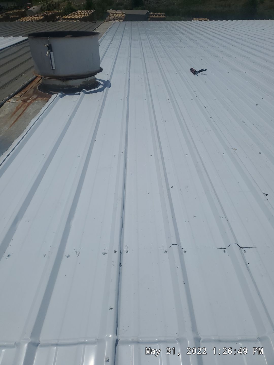 Commercial Roofing Installation using Aluminum Roofing panels by Hostetler Roofing