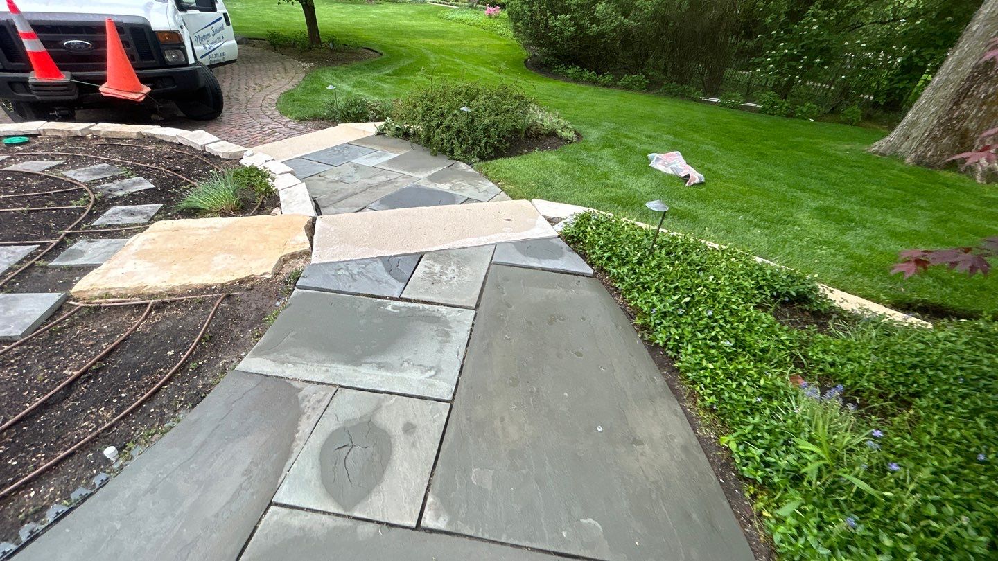 Winnetka, IL bluestone patio cleaning by Northern Power Washing LLC.