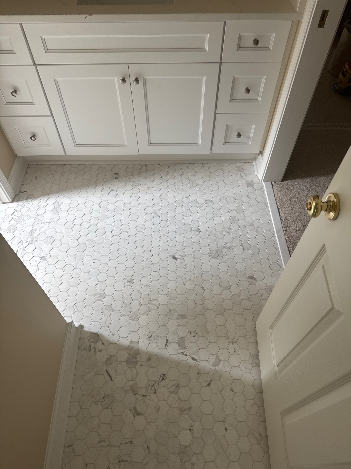 Marietta Bathroom and Laundry Room Floor and Vanity Remodel by Swift Home Renovations