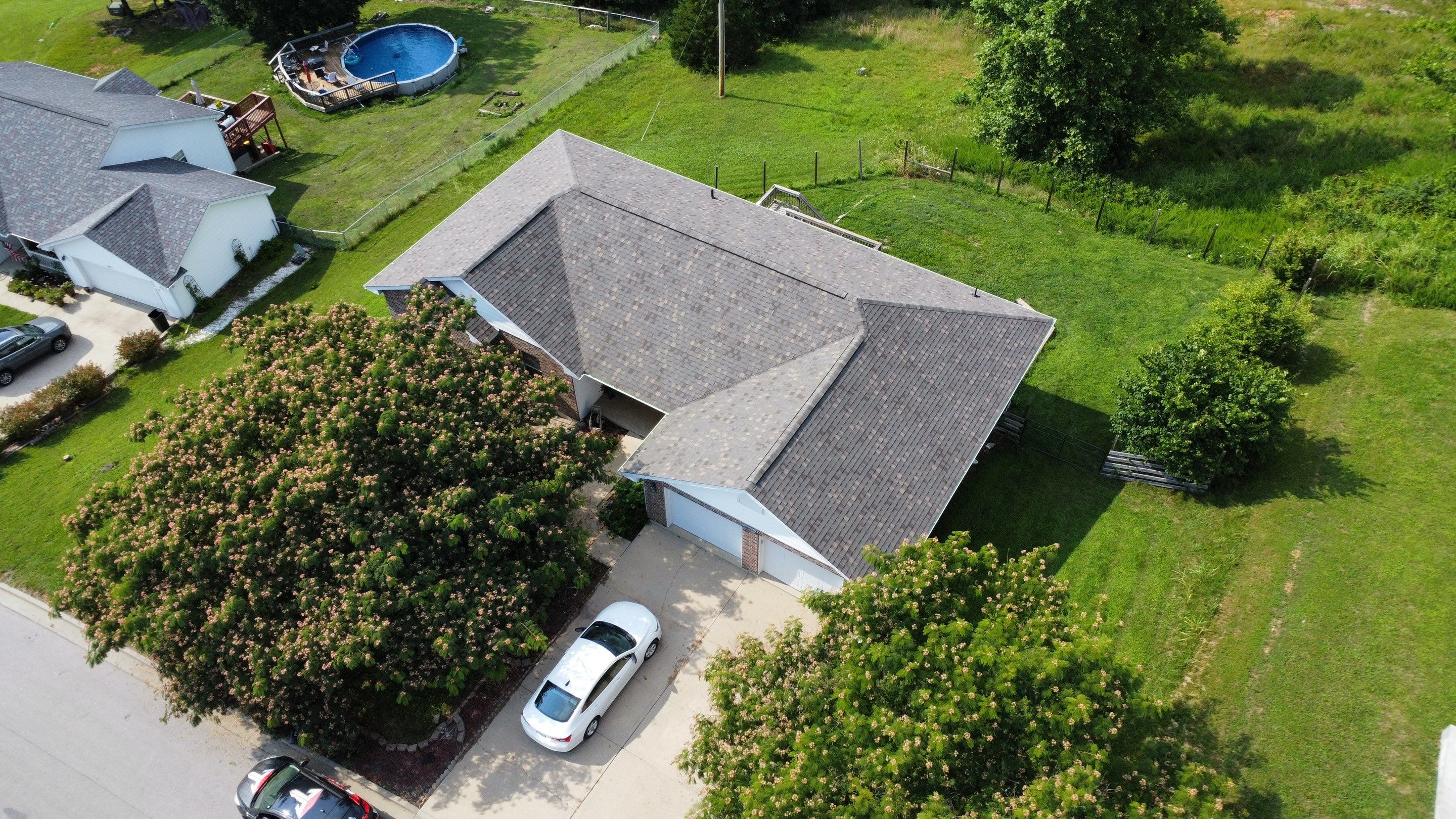 Residential Roofing Install - Atlas Pinnacle Pristine W/ Scotchguard - Color Weather Wood  by Titan Commercial & Residential Roofing 