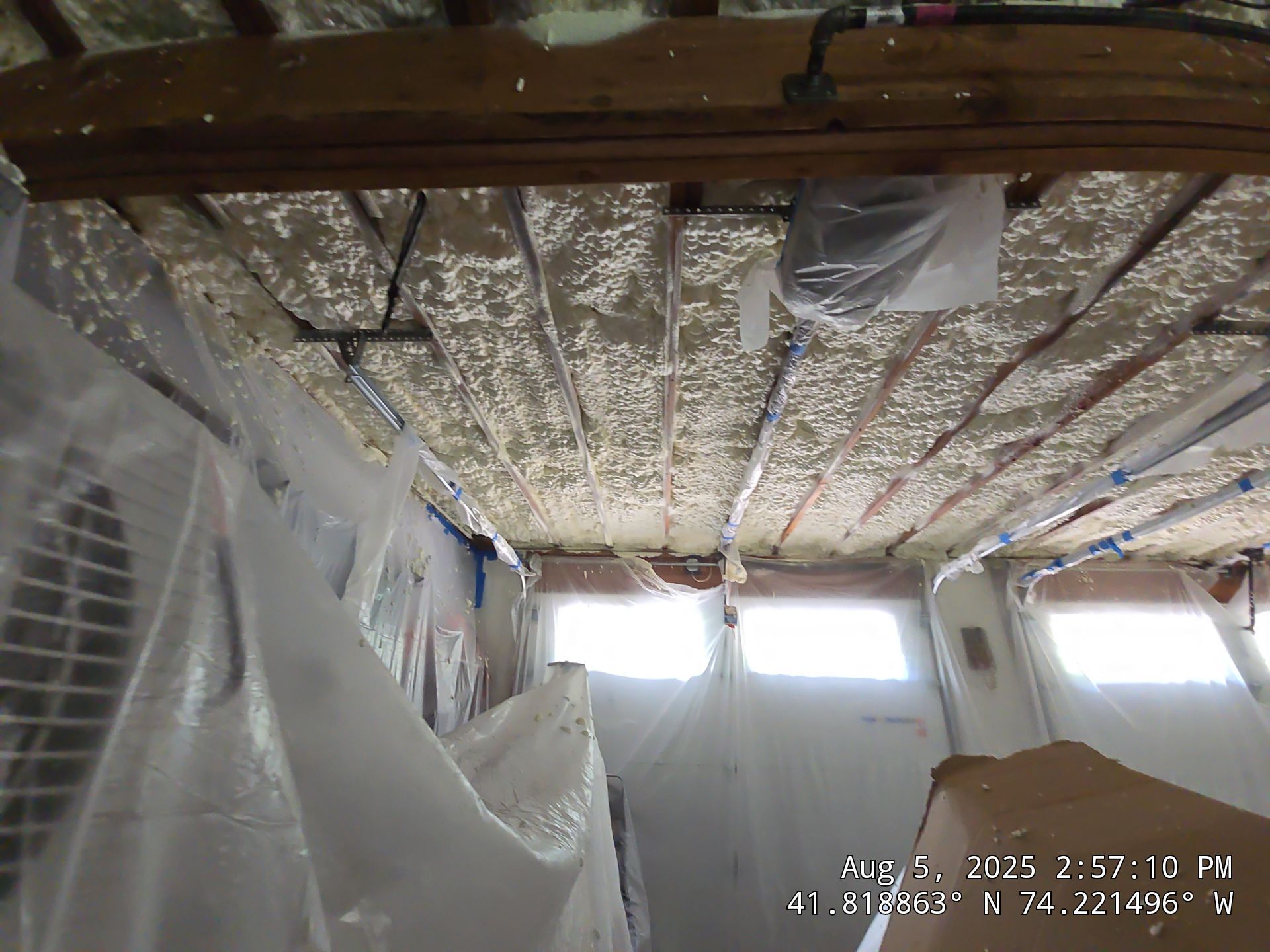 Master bedroom Exterior Walls using open cell spray foam by NYS Foam & Energy