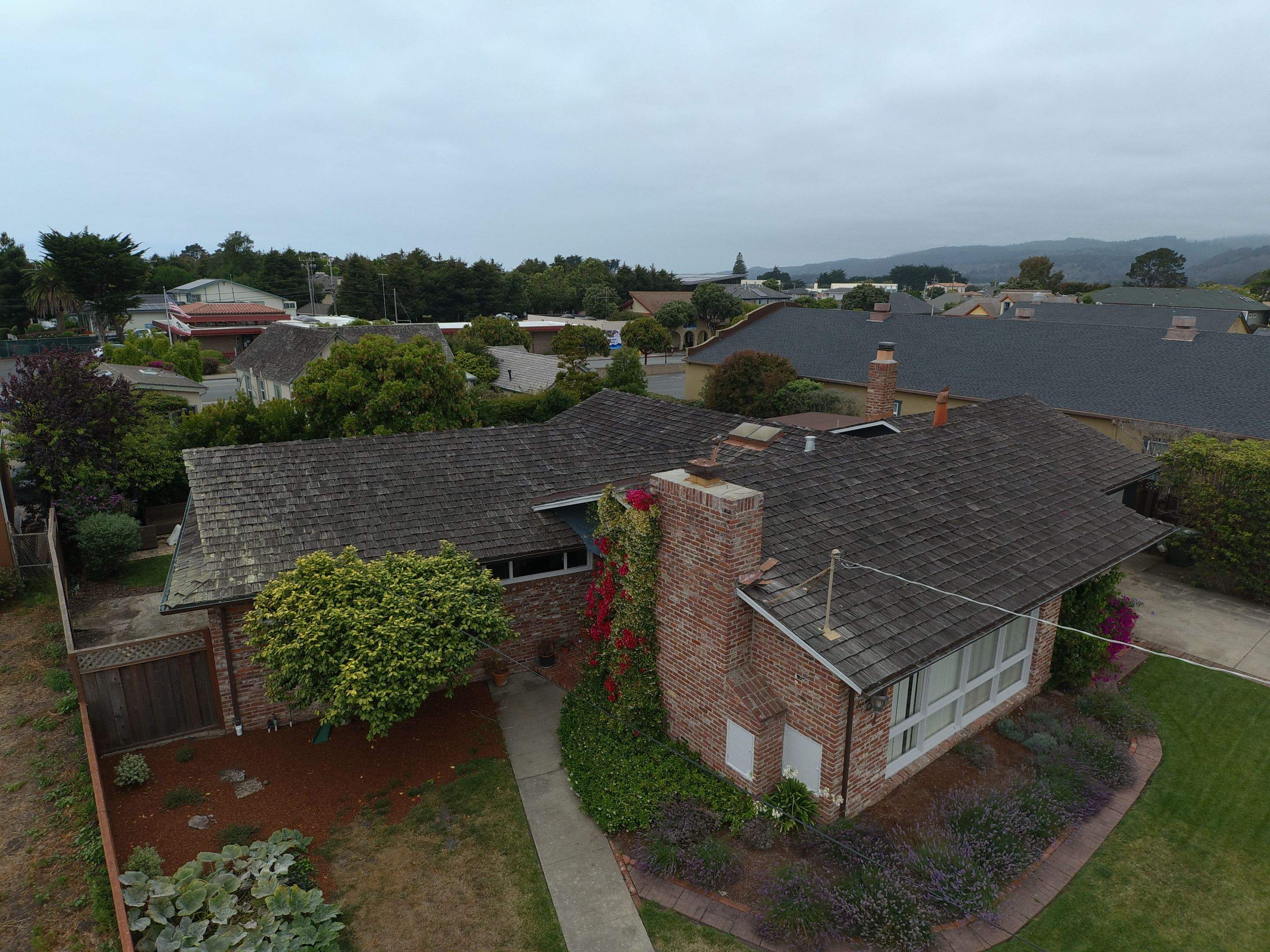 Refurbish and repair shake roof to get ready to sell by Straight Edge Roofing Inc