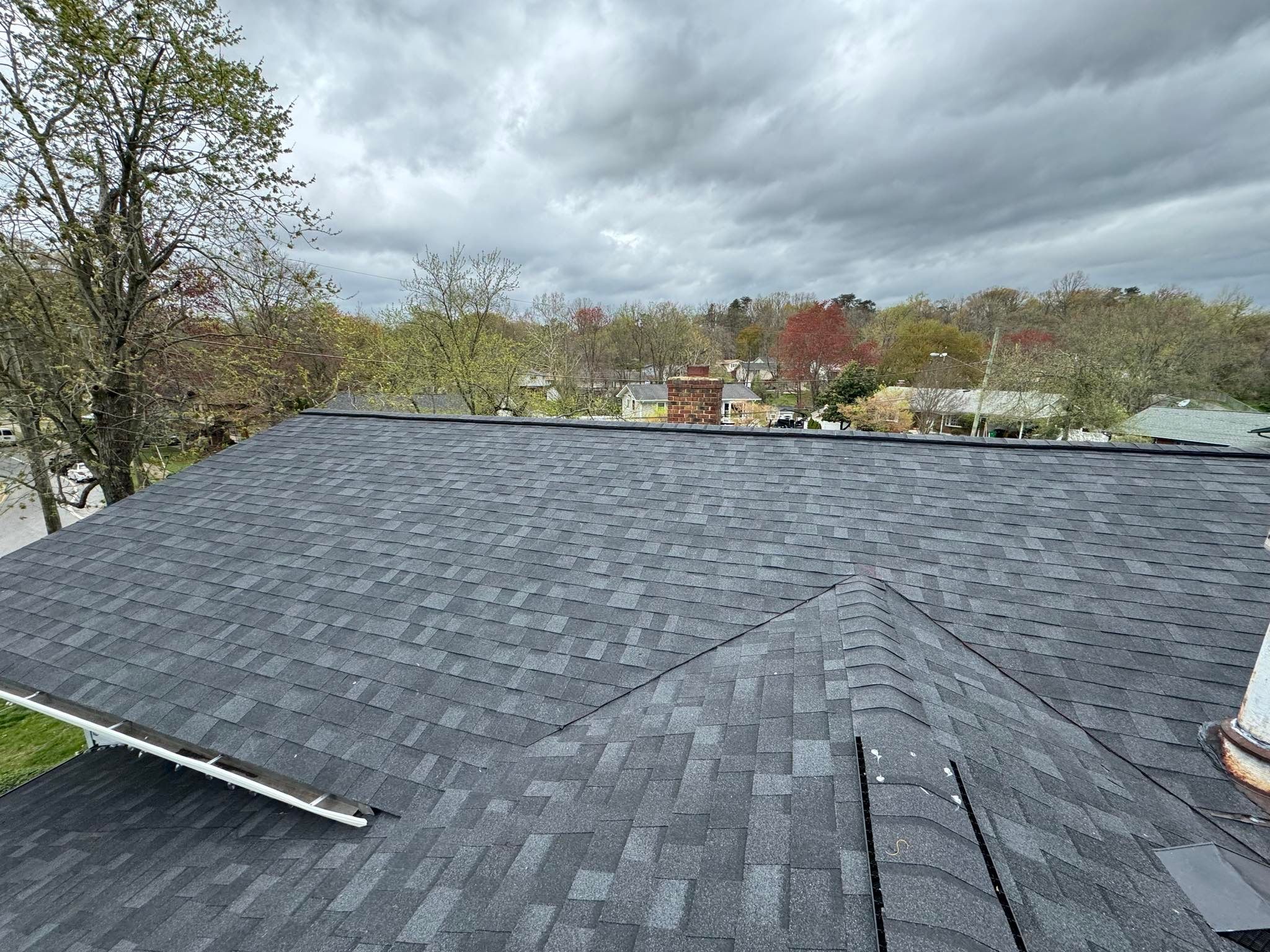 Estate Gray Shingles by Reimagine Roofing