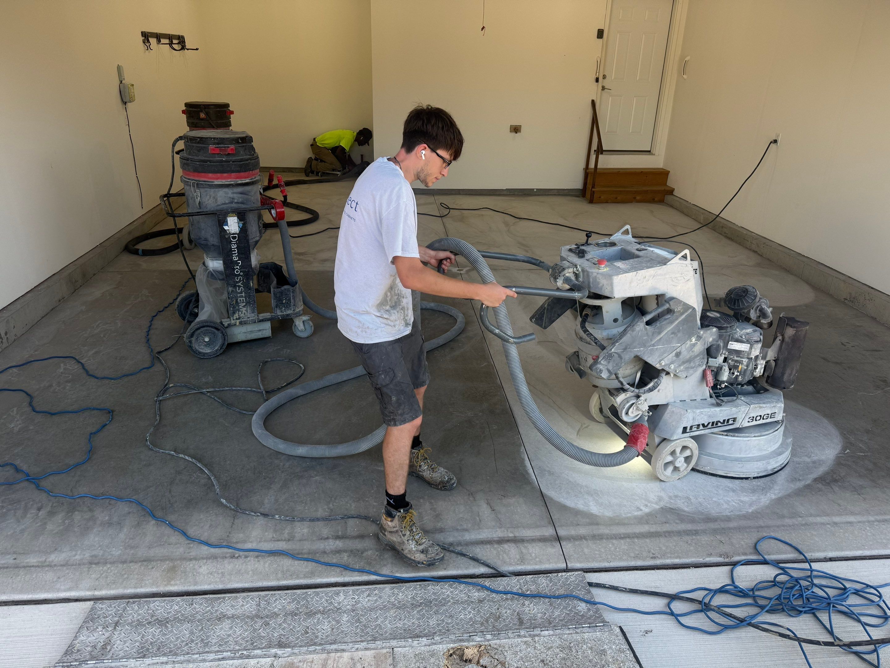 Cabin Fever Garage Floor Coating in Sioux Falls by Select Painting, Coatings & Garage Cabinets