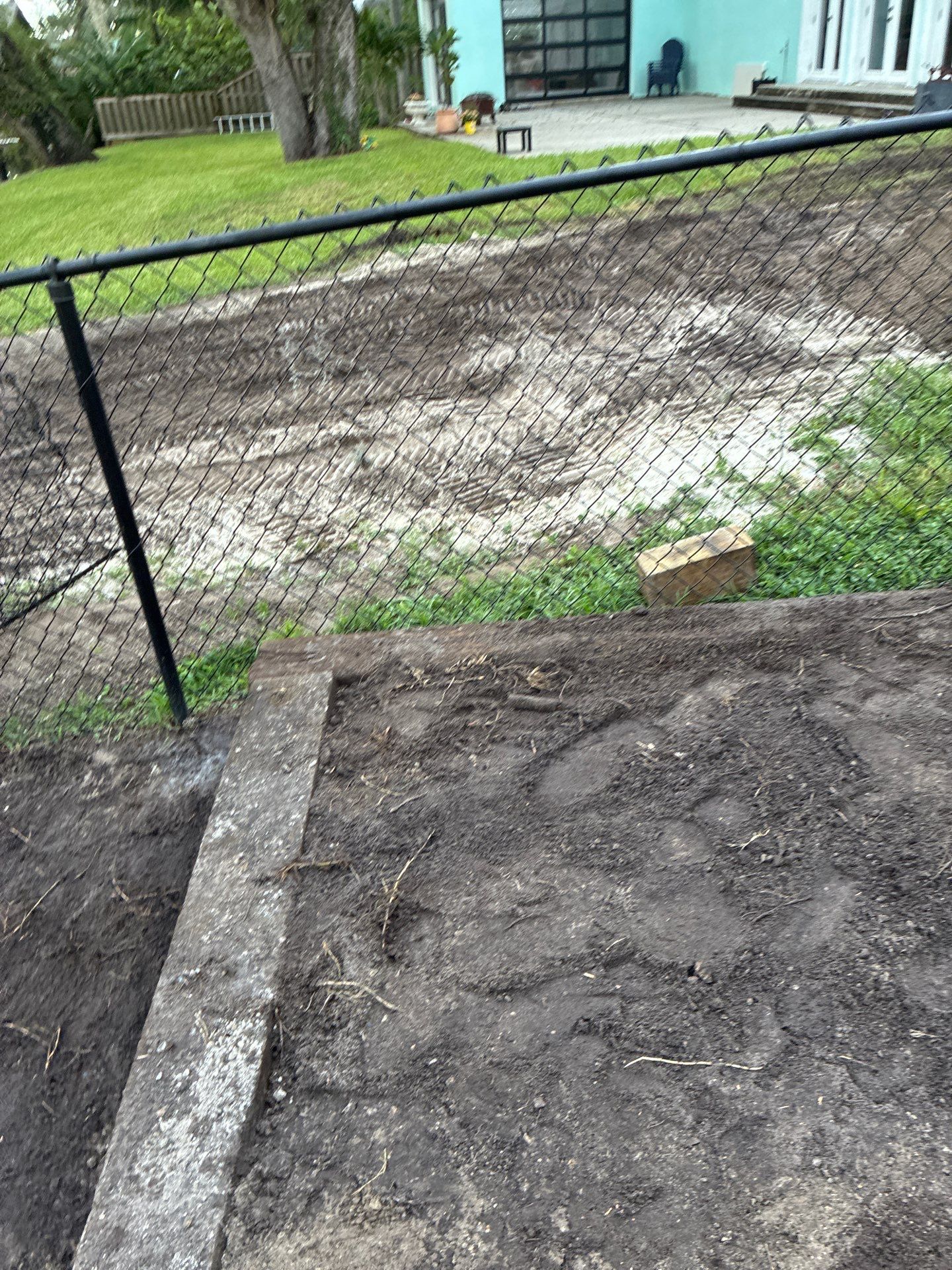 Grading back yard oasis by Level One Grading