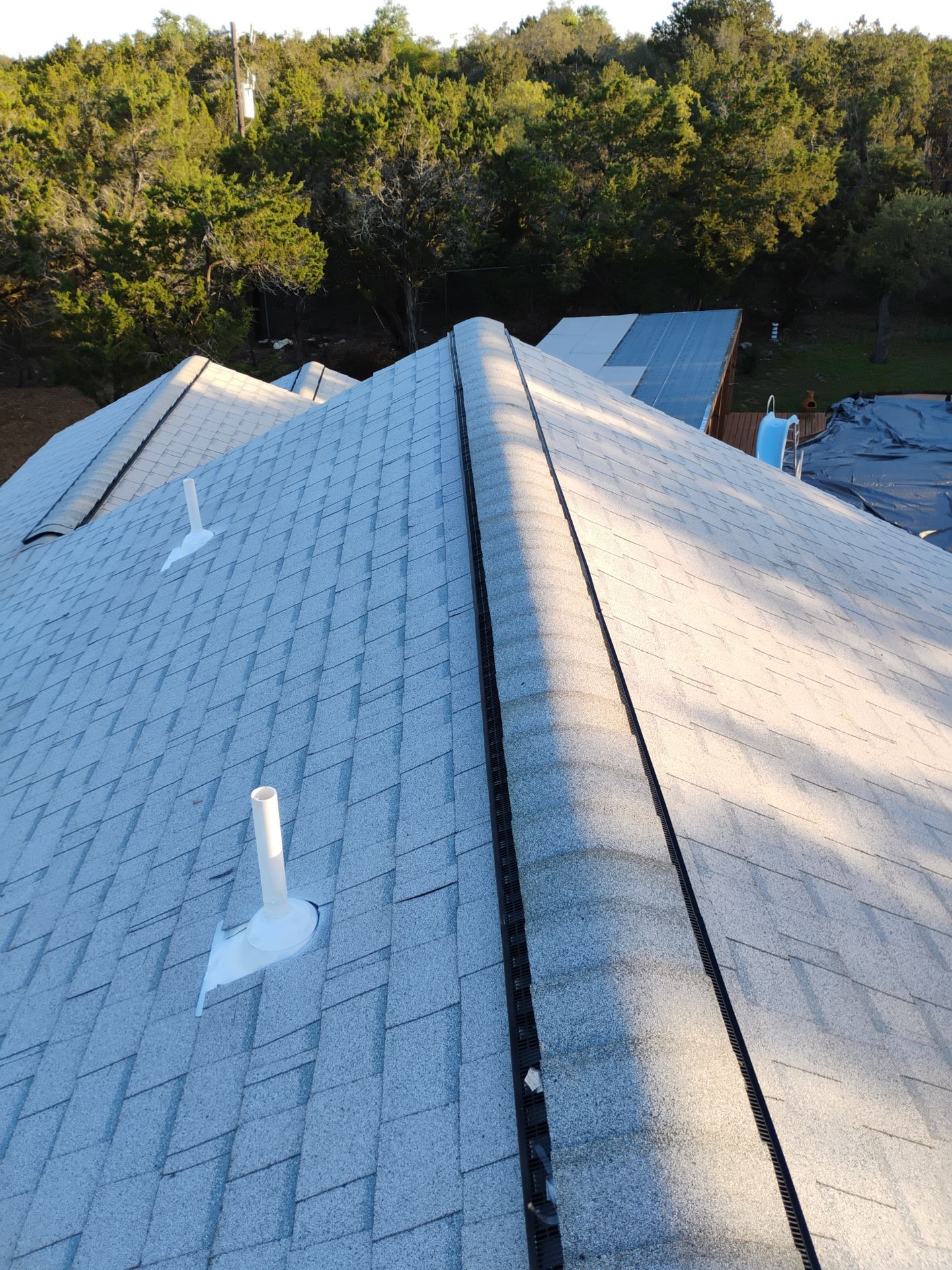 Leander Hail Damage Restoration and Architectural Shingle Roof Replacement by Caliber Restoration LLC